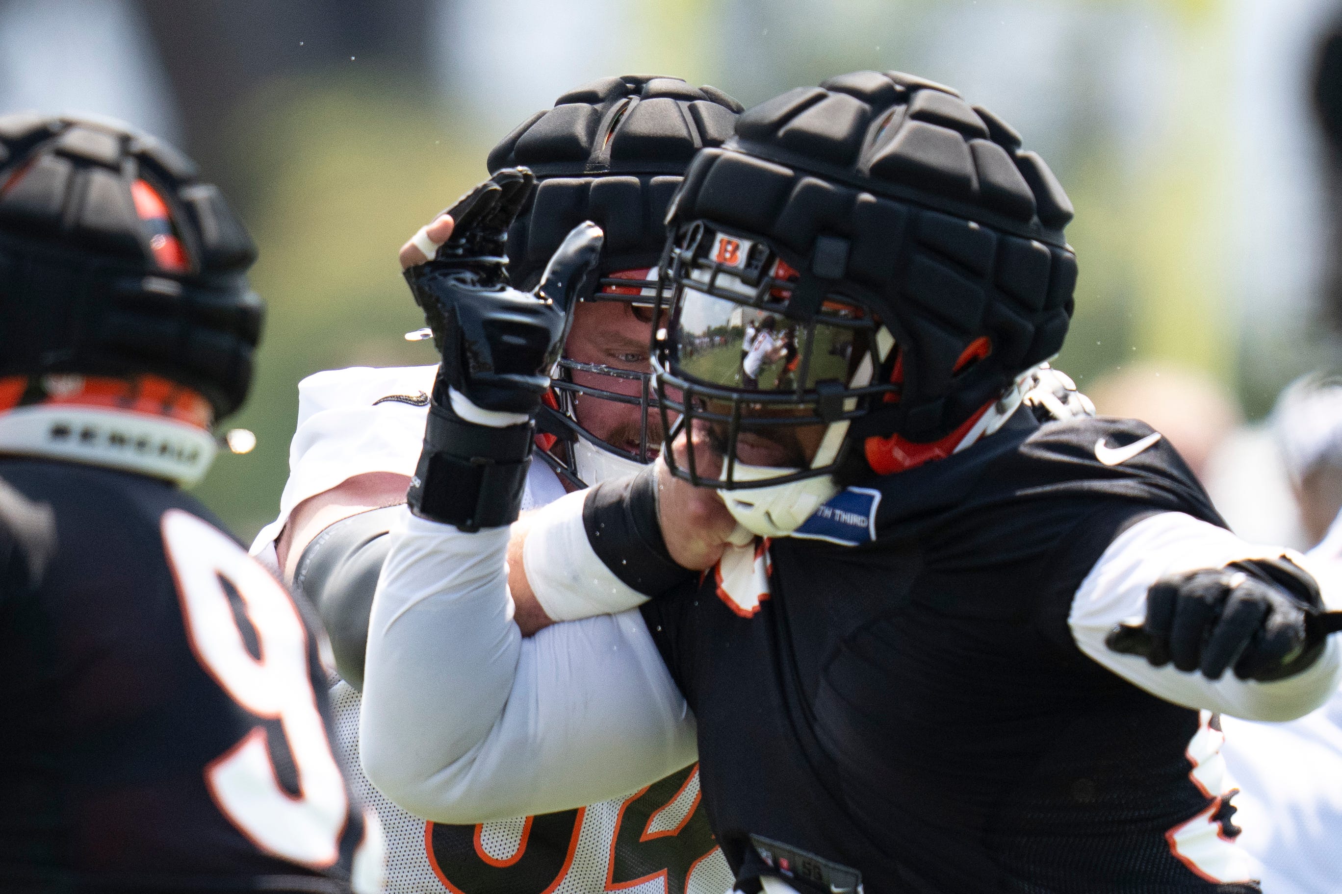 Cincinnati Bengals guard Alex Cappa (65) blocks Cincinnati Bengals defensive tackle Sheldon Rankins (98) during Cincinnati Bengals training camp in Cincinnati on Friday, July 26, 2024.