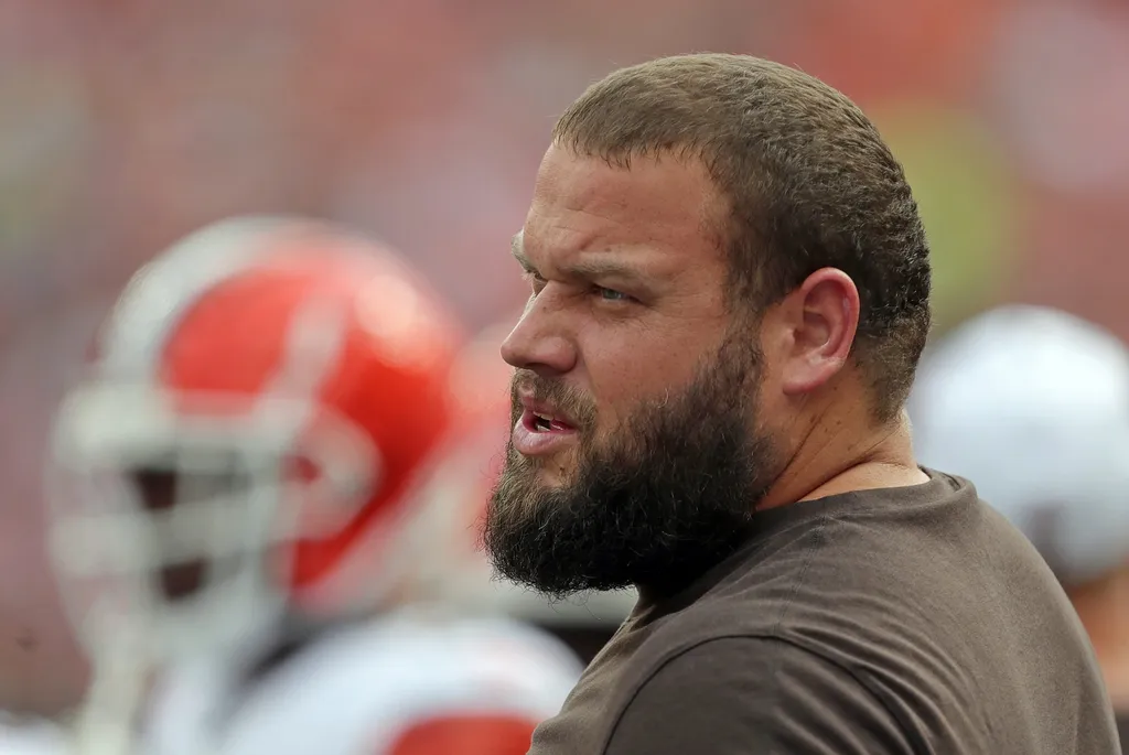 Browns guard Joel Bitonio watches from the sideline during the first half of a preseason game, Saturday, Aug. 17, 2024, in Cleveland