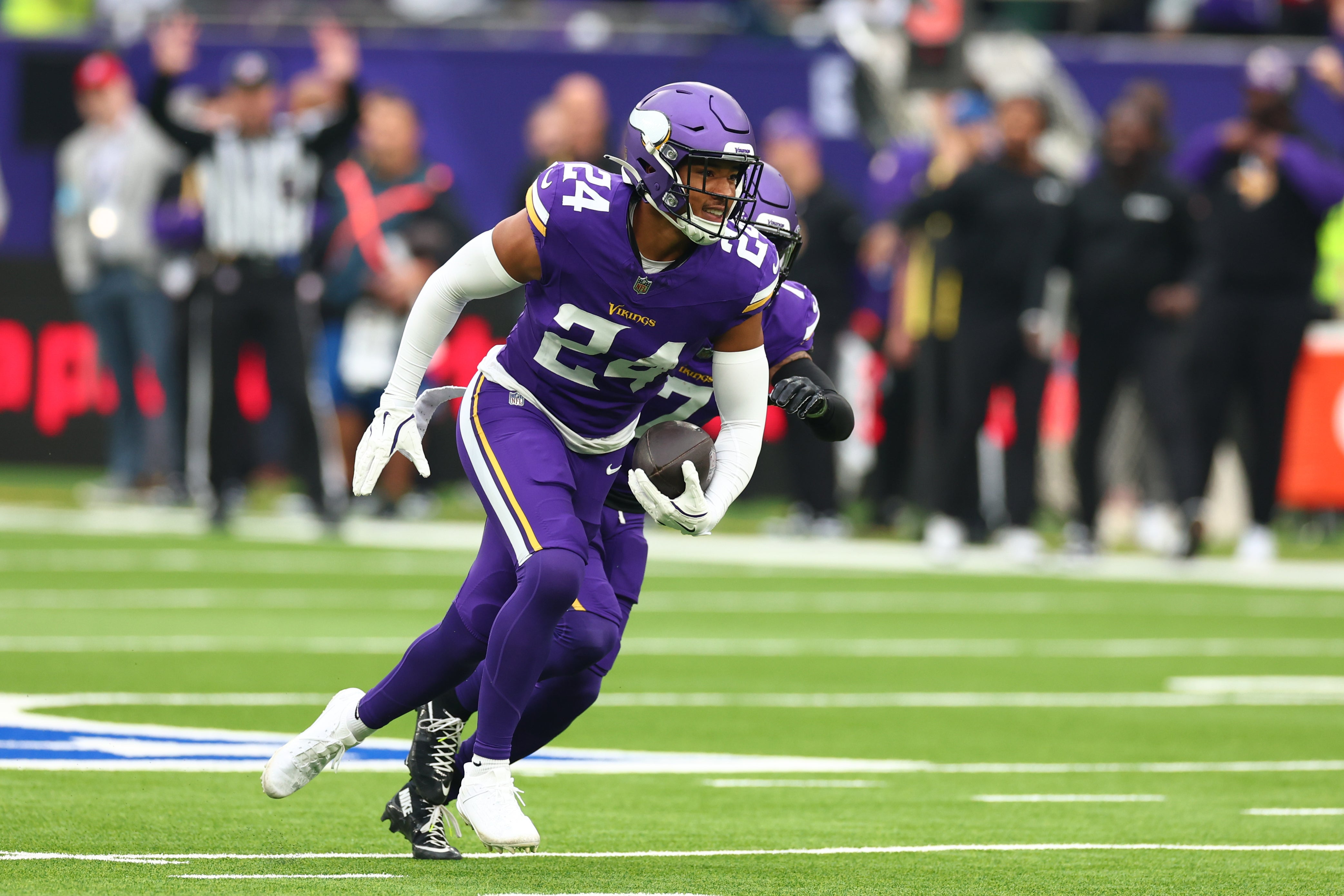 Oct 6, 2024; Tottenham, ENG; Minnesota Vikings Defensive Back Camryn Bynum (24) celebrates an interception in the 1st Quarter against New York Jets at Tottenham Hotspur Stadium.