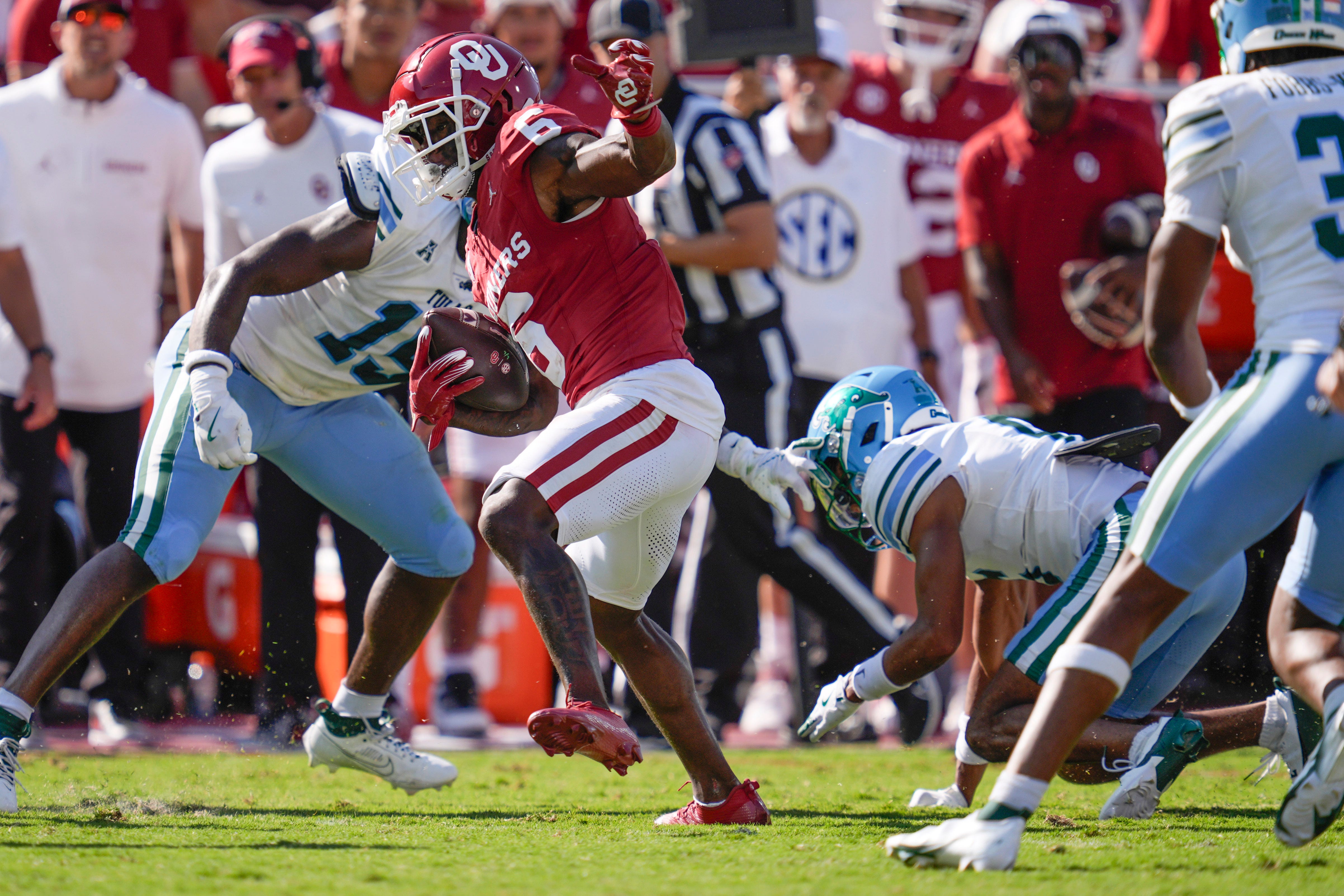 Oklahoma Sooners wide receiver Deion Burks (6) runs after a reception during a college football game between the University of Oklahoma Sooners (OU) and the Tulane Green Wave at Gaylord Family - Oklahoma Memorial Stadium in Norman, Okla., Saturday, Sept. 14, 2024.