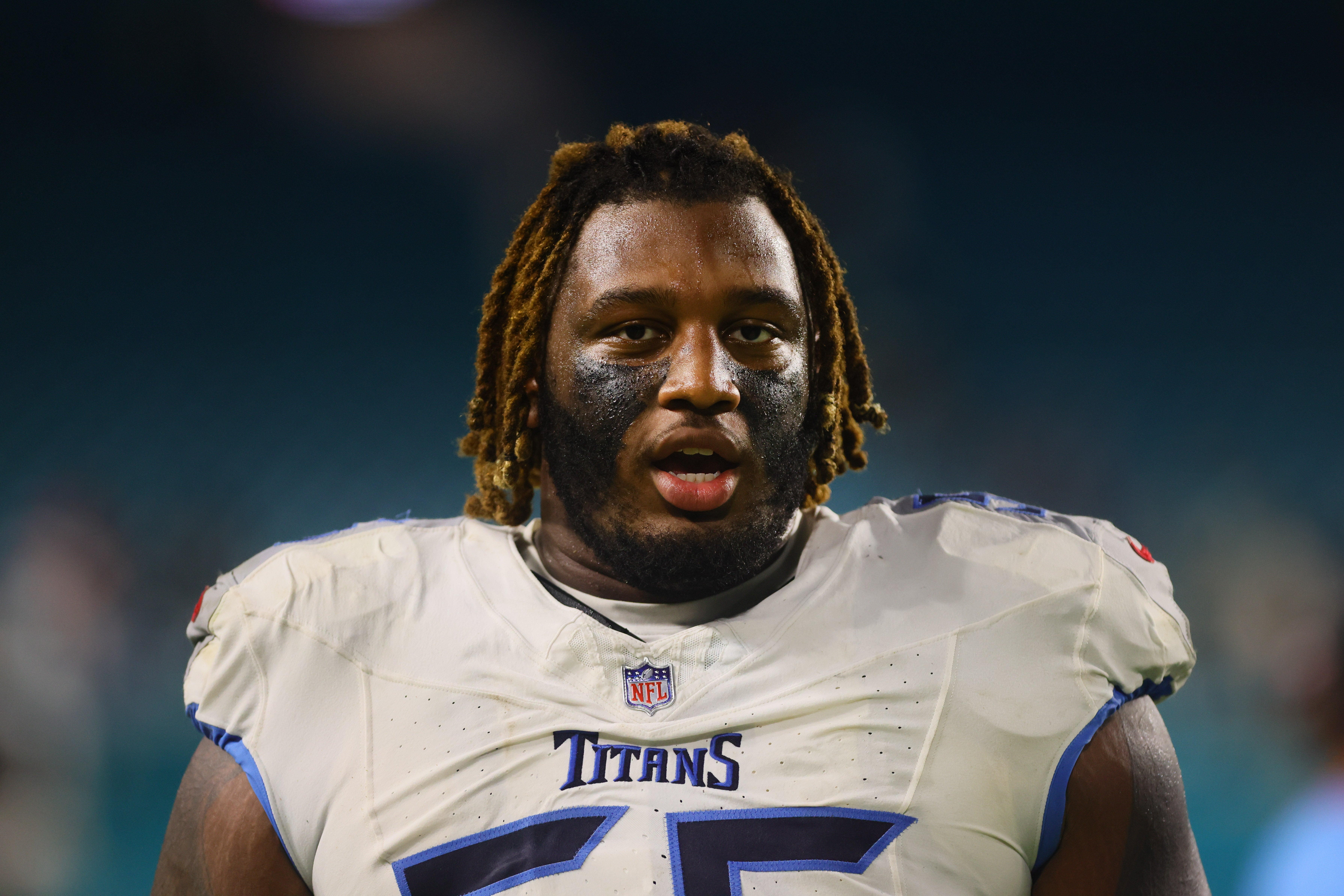 Tennessee Titans offensive tackle JC Latham (55) looks on after the game against the Miami Dolphins at Hard Rock Stadium. Sam Navarro-Imagn Images