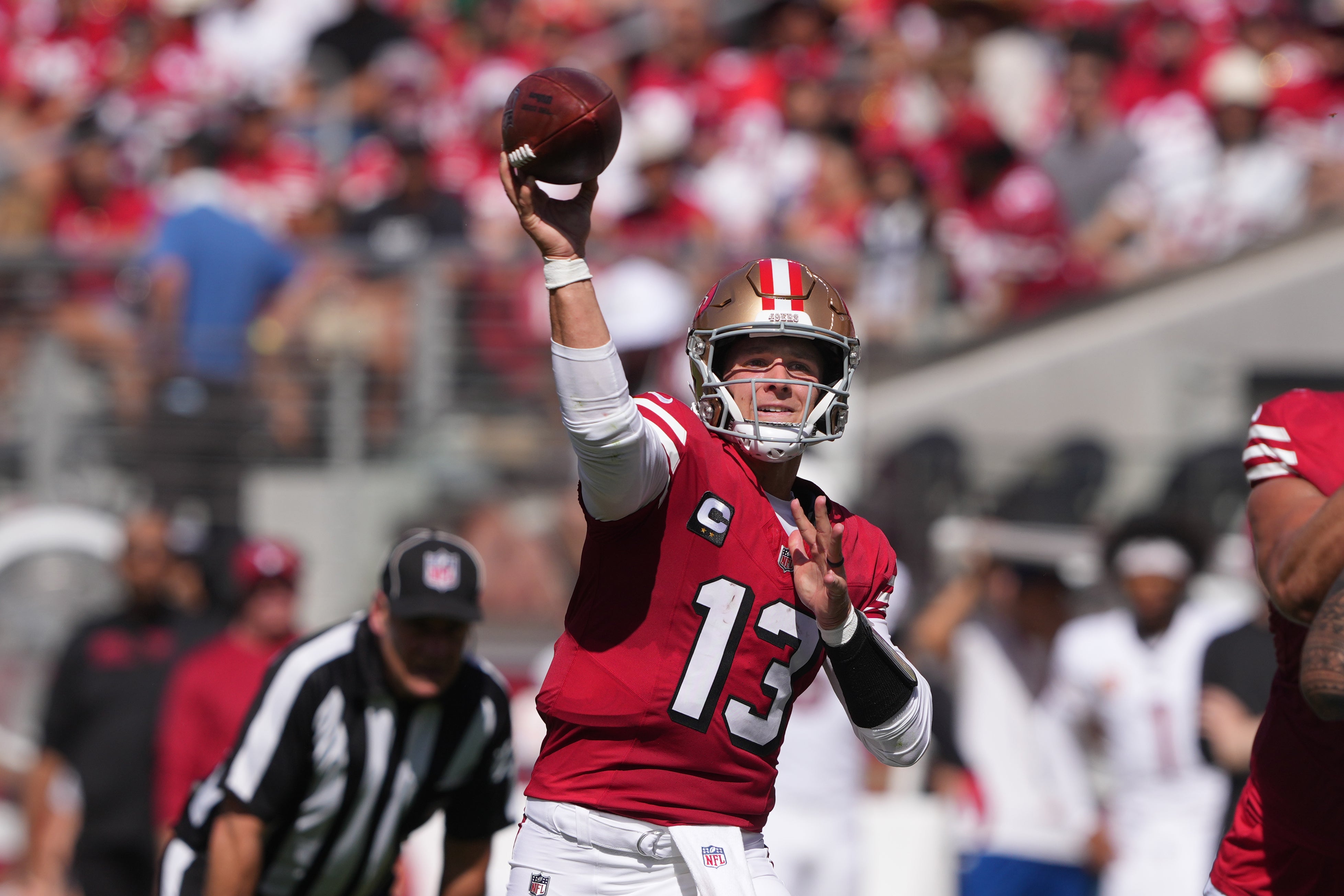 San Francisco 49ers quarterback Brock Purdy (13) throws a pass against the Arizona Cardinals during the first quarter at Levi's Stadium.