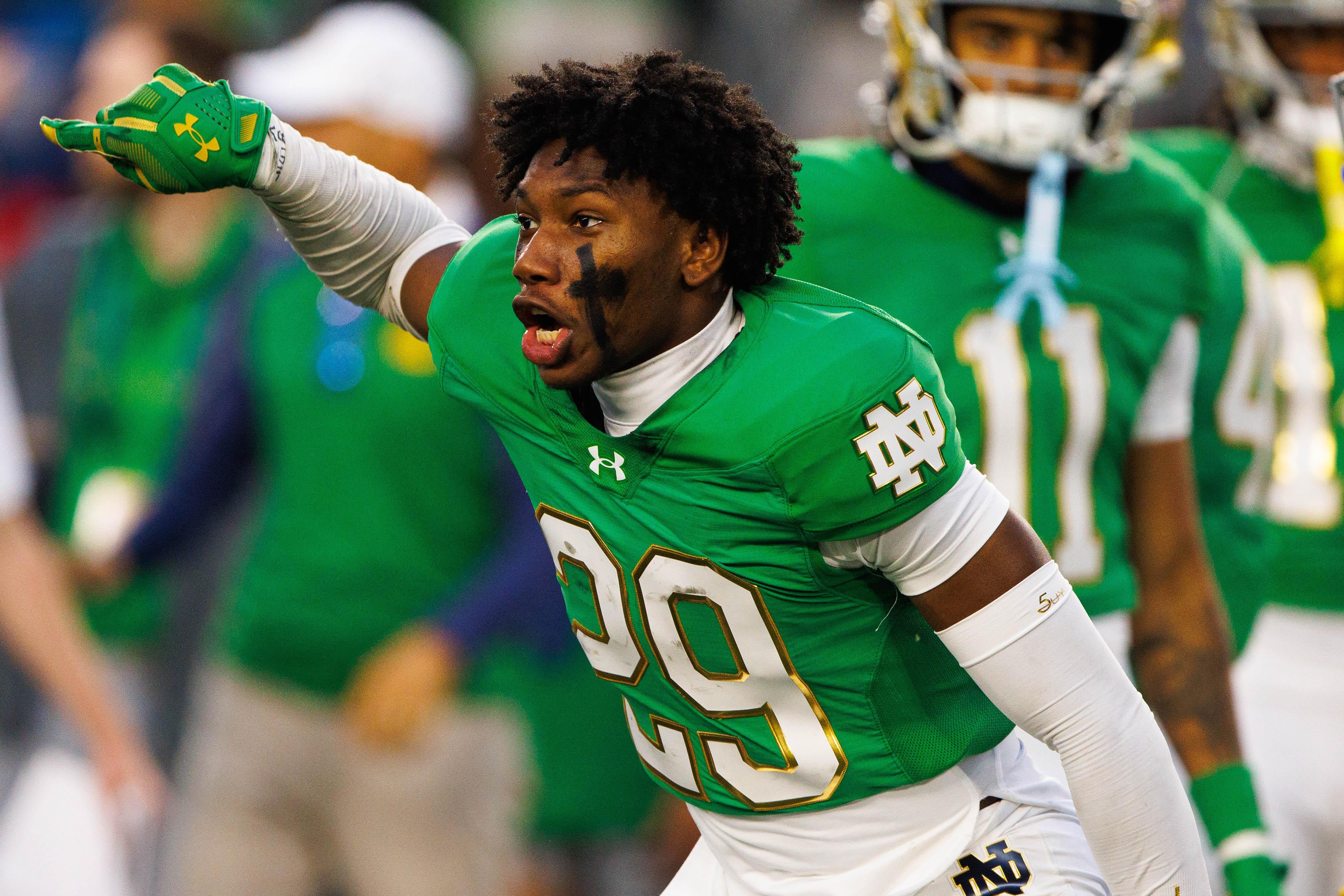 Notre Dame cornerback Christian Gray (29) celebrates winning a NCAA college football game 31-24 against Louisville at Notre Dame Stadium.