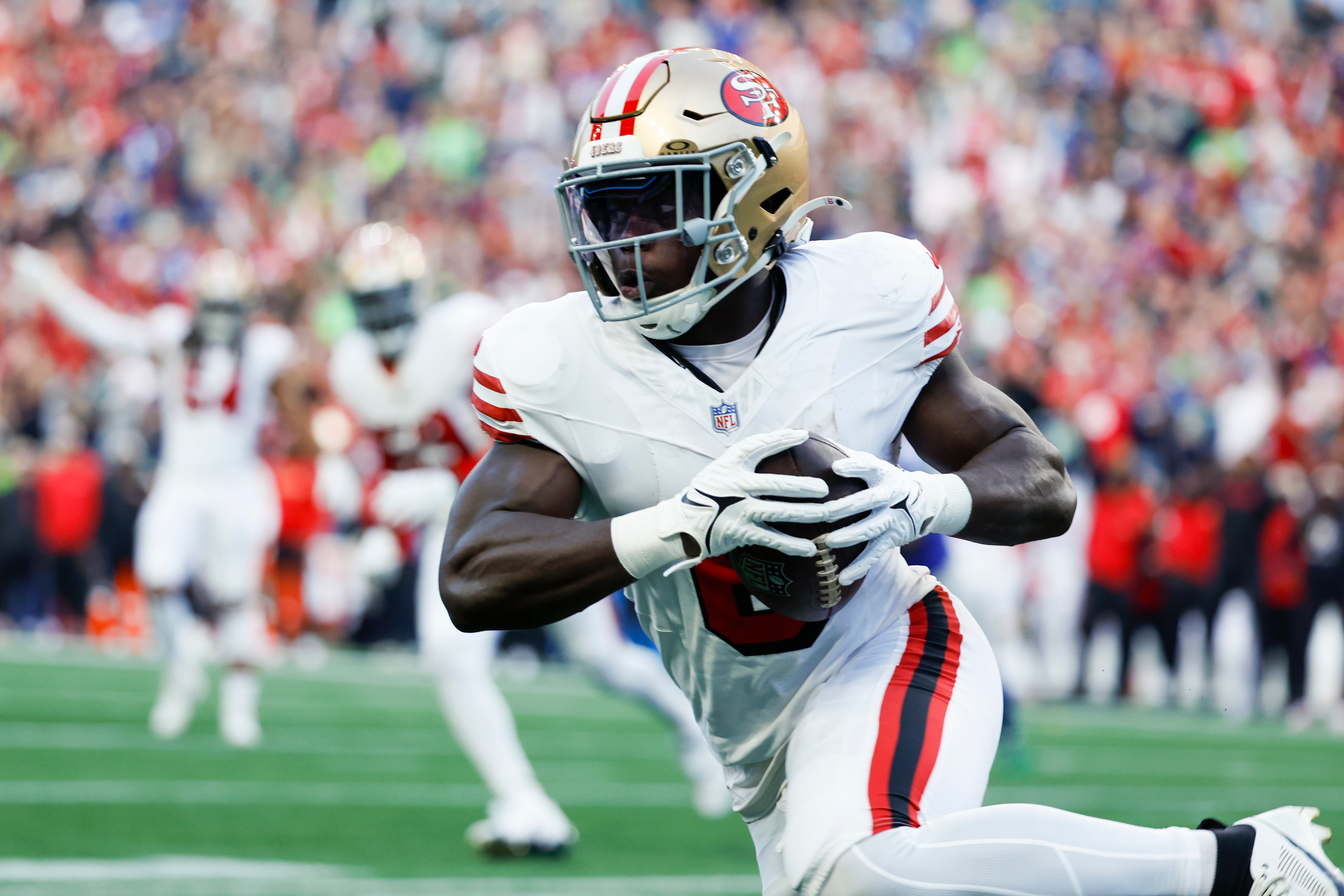 San Francisco 49ers safety Malik Mustapha (6) returns an interception against the Seattle Seahawks during the first quarter at Lumen Field.