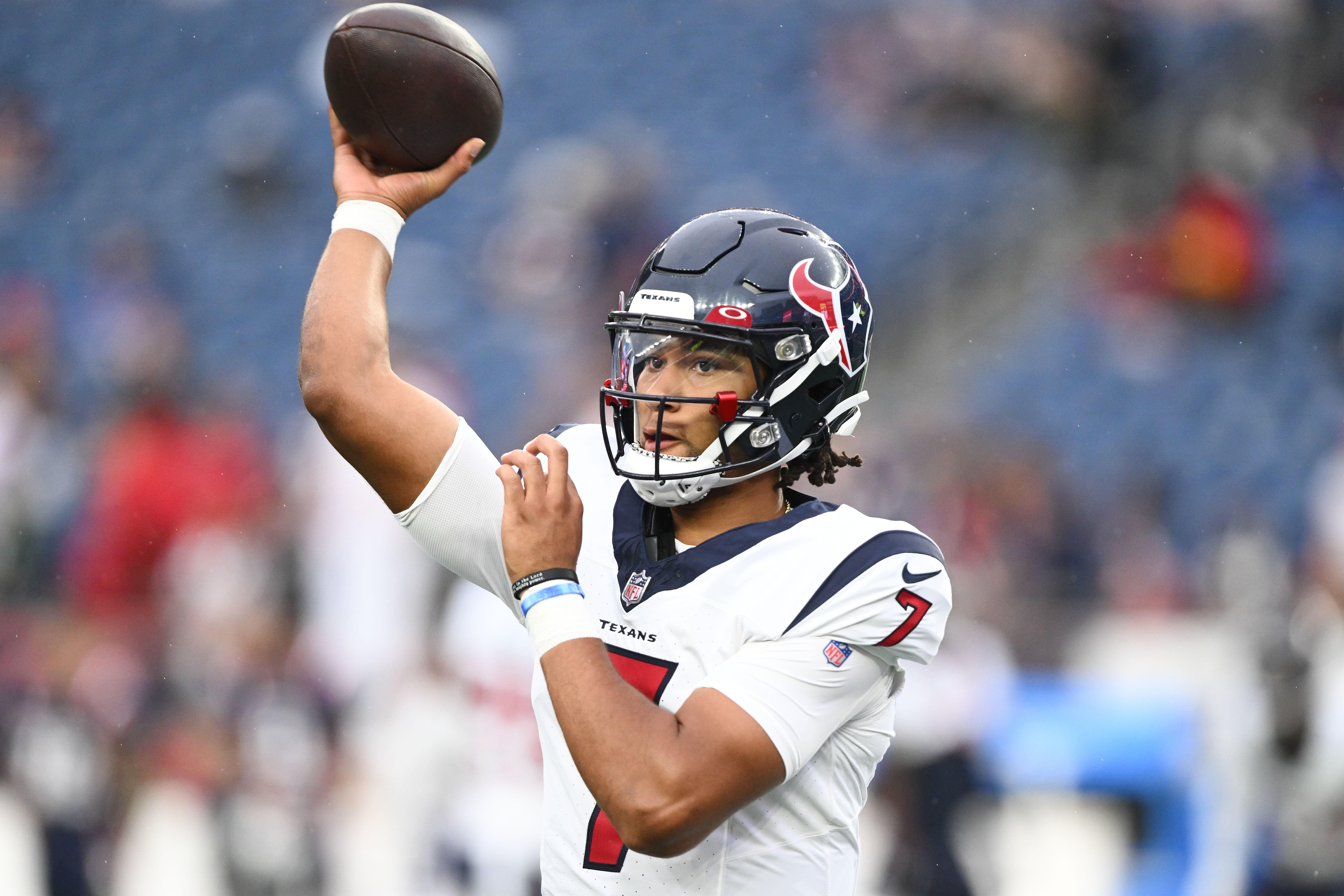 Aug 10, 2023; Foxborough, Massachusetts, USA; Houston Texans quarterback C.J. Stroud (7) throws the ball during warmups before a game against the New England Patriots at Gillette Stadium.