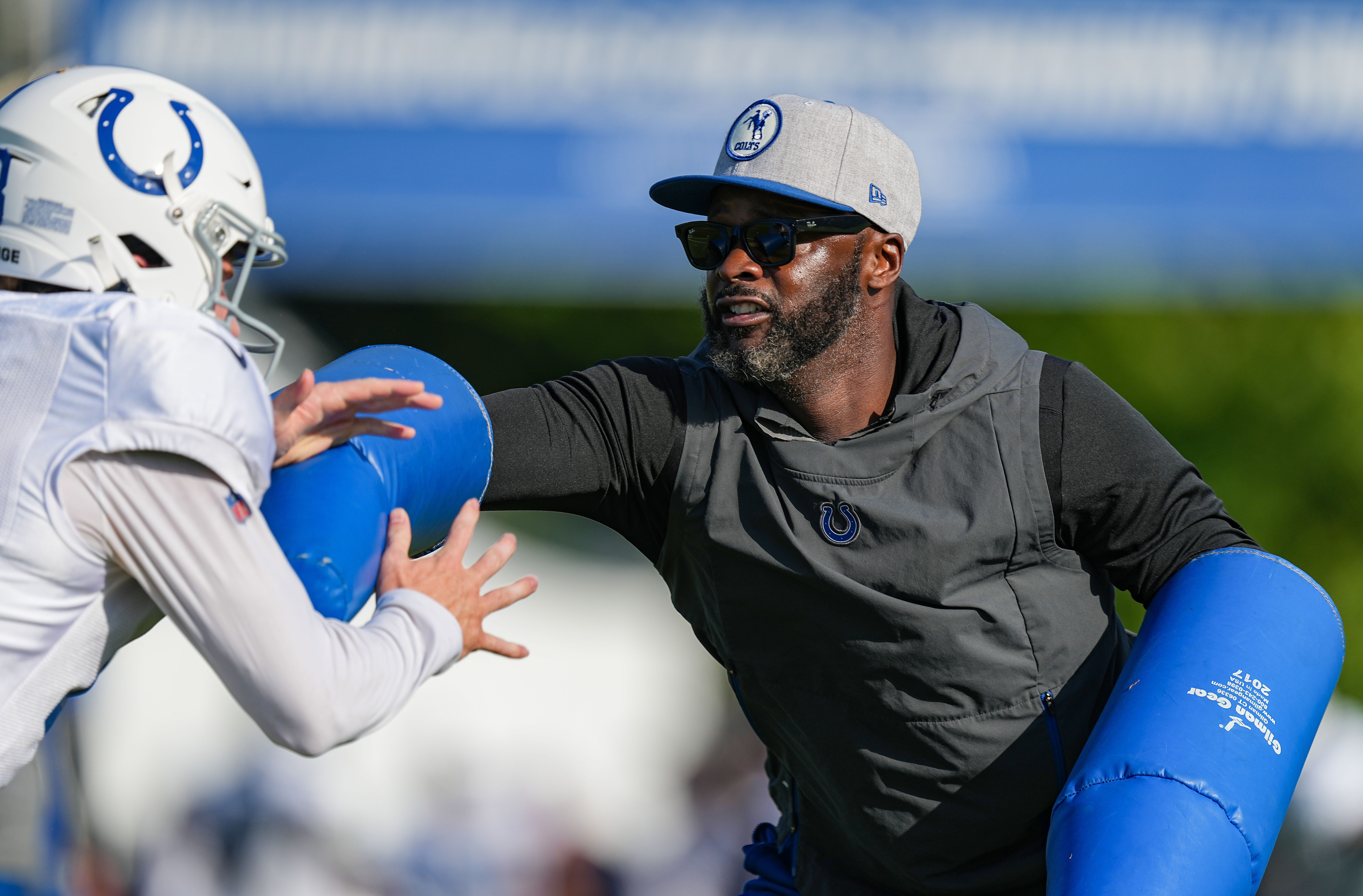 Indianapolis Colts wide receiver coach Reggie Wayne helping with drills Thursday, Aug. 17, 2023, during training camp at Grand Park Sports Campus in Westfield.