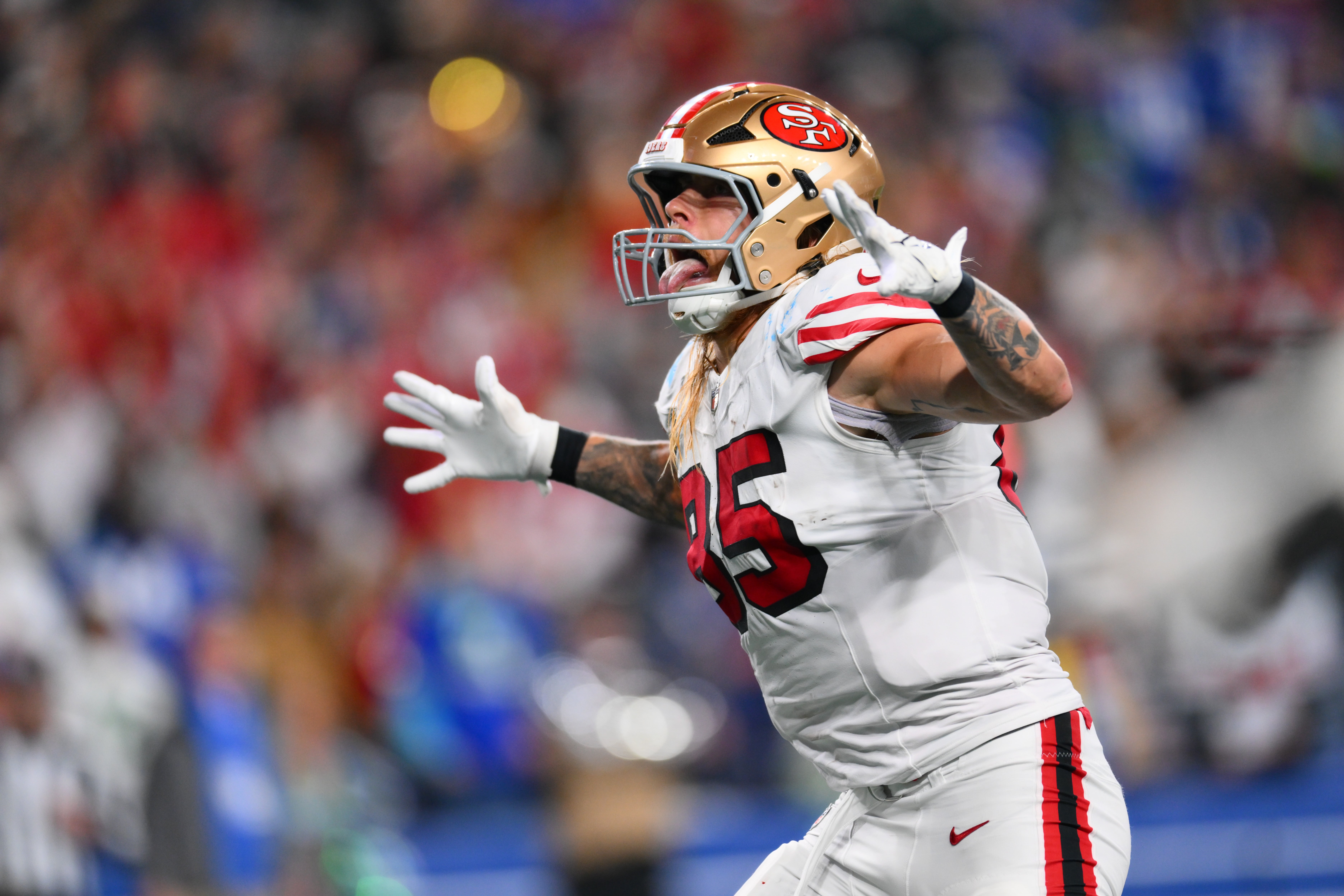 San Francisco 49ers tight end George Kittle (85) celebrates after scoring a touchdown against the Seattle Seahawks during the second half at Lumen Field.
