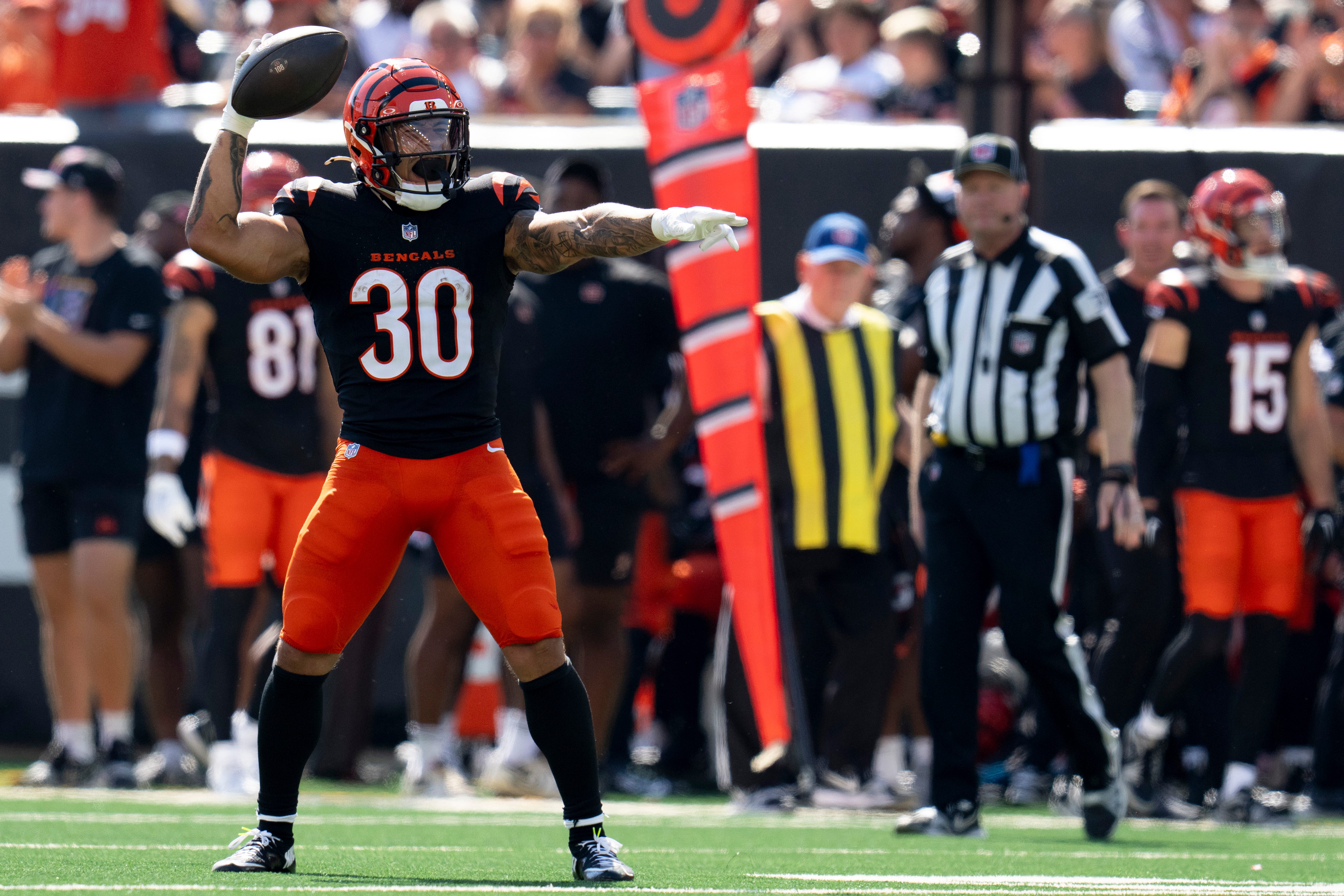 Cincinnati Bengals halfback Chase Brown (30) reacts to getting a first down in the first quarter of the NFL game against the Baltimore Ravens at Paycor Stadium in Cincinnati on Sunday, Oct. 6, 2024.