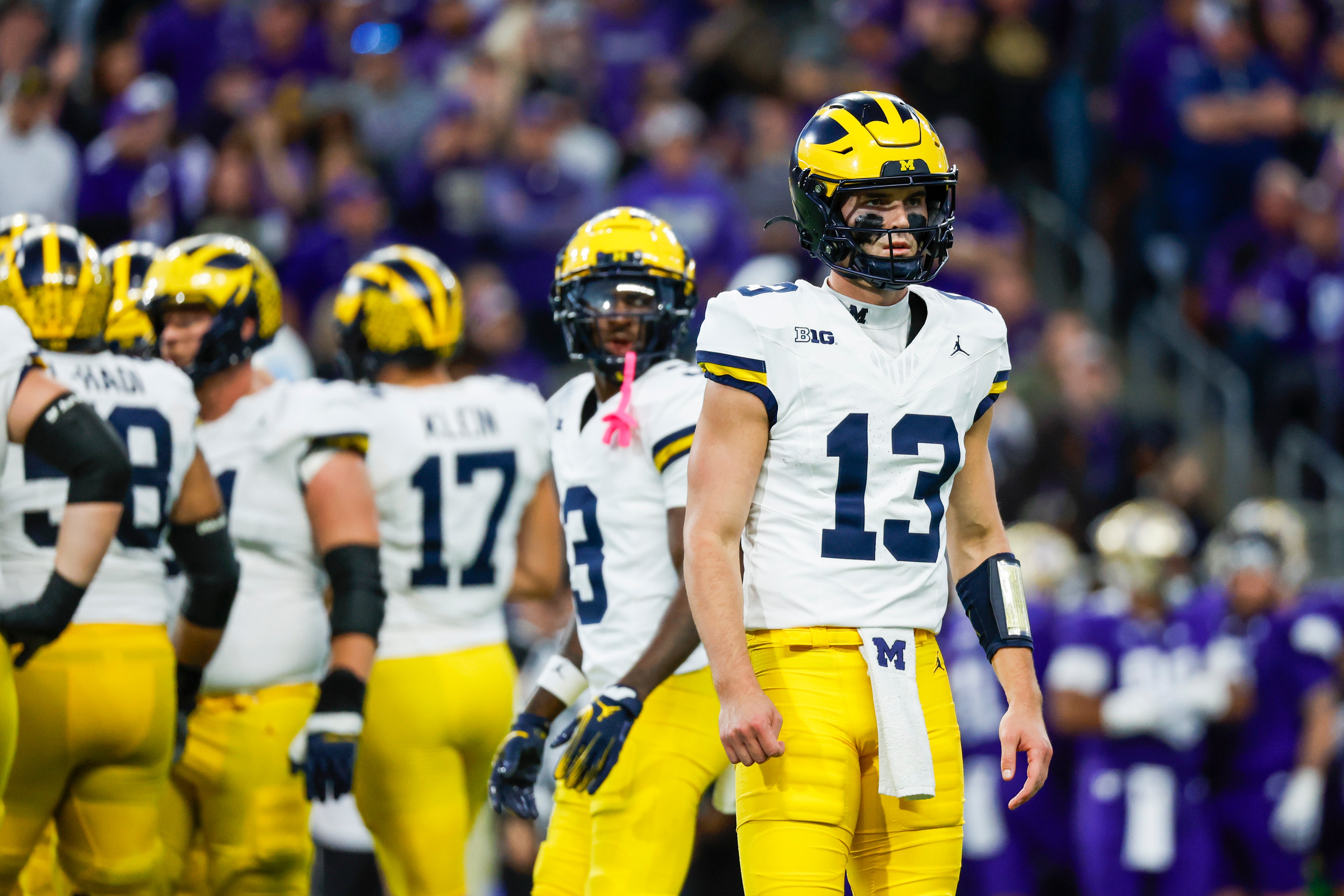 Oct 5, 2024; Seattle, Washington, USA; Michigan Wolverines quarterback Jack Tuttle (13) waits for a play to come in against the Washington Huskies during the third quarter at Alaska Airlines Field at Husky Stadium.