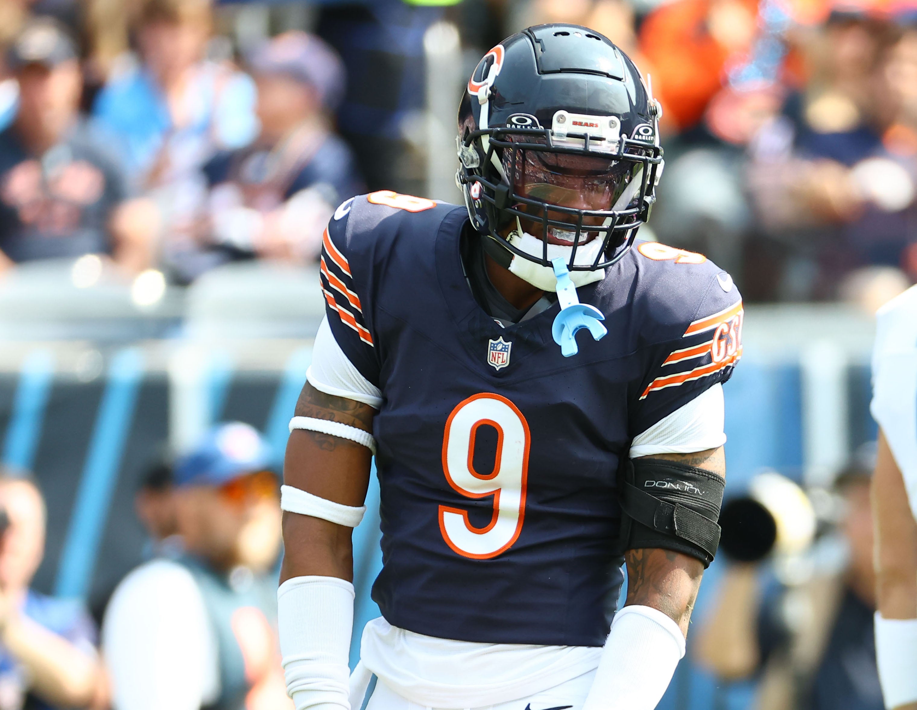 Sep 8, 2024; Chicago, Illinois, USA; Chicago Bears safety Jaquan Brisker (9) reacts against the Tennessee Titans during the first quarter at Soldier Field.