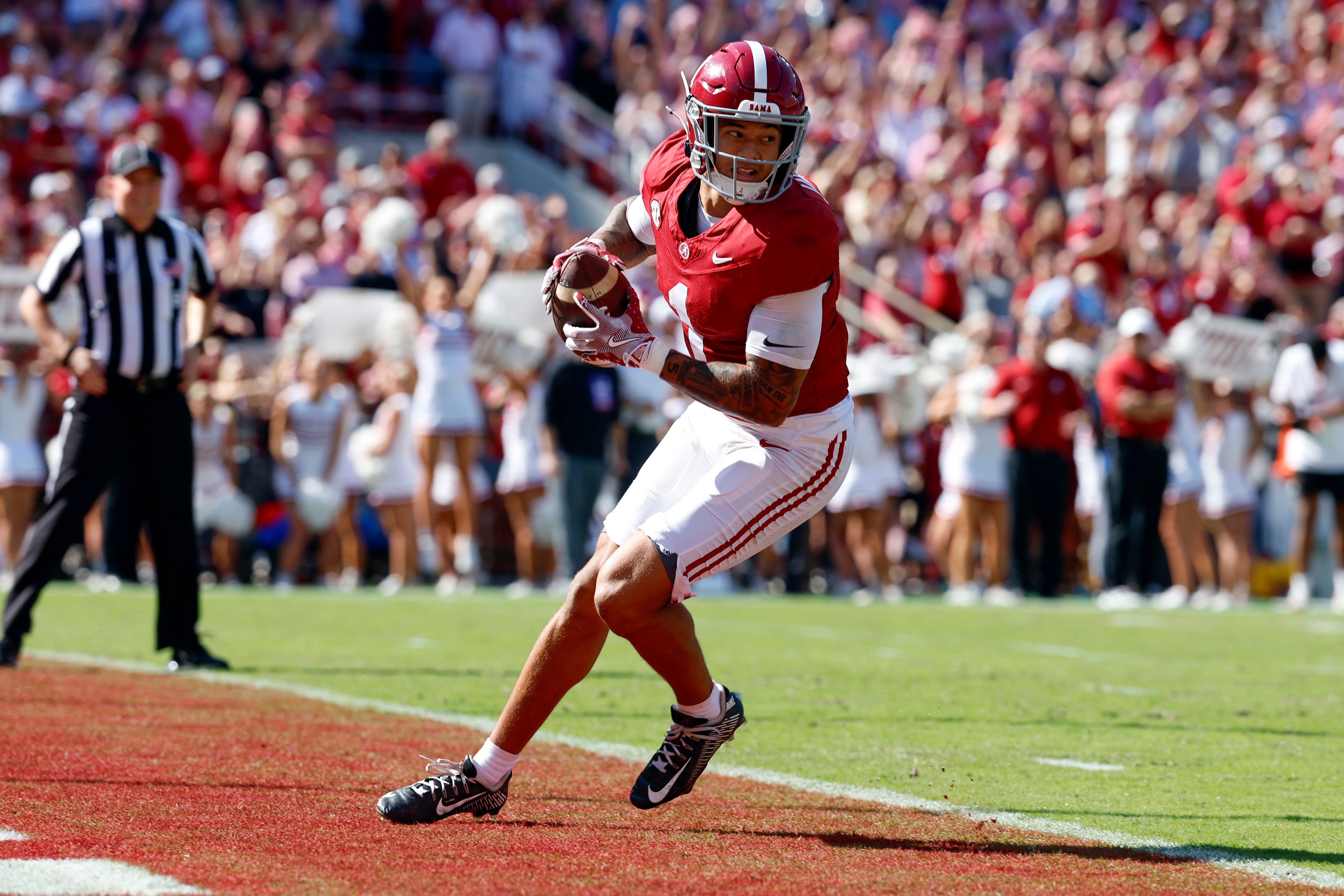 Oct 12, 2024; Tuscaloosa, Alabama, USA; Alabama Crimson Tide defensive back Domani Jackson (1) intercepts a pass to seal the win over the South Carolina Gamecocks during the second half at Bryant-Denny Stadium.