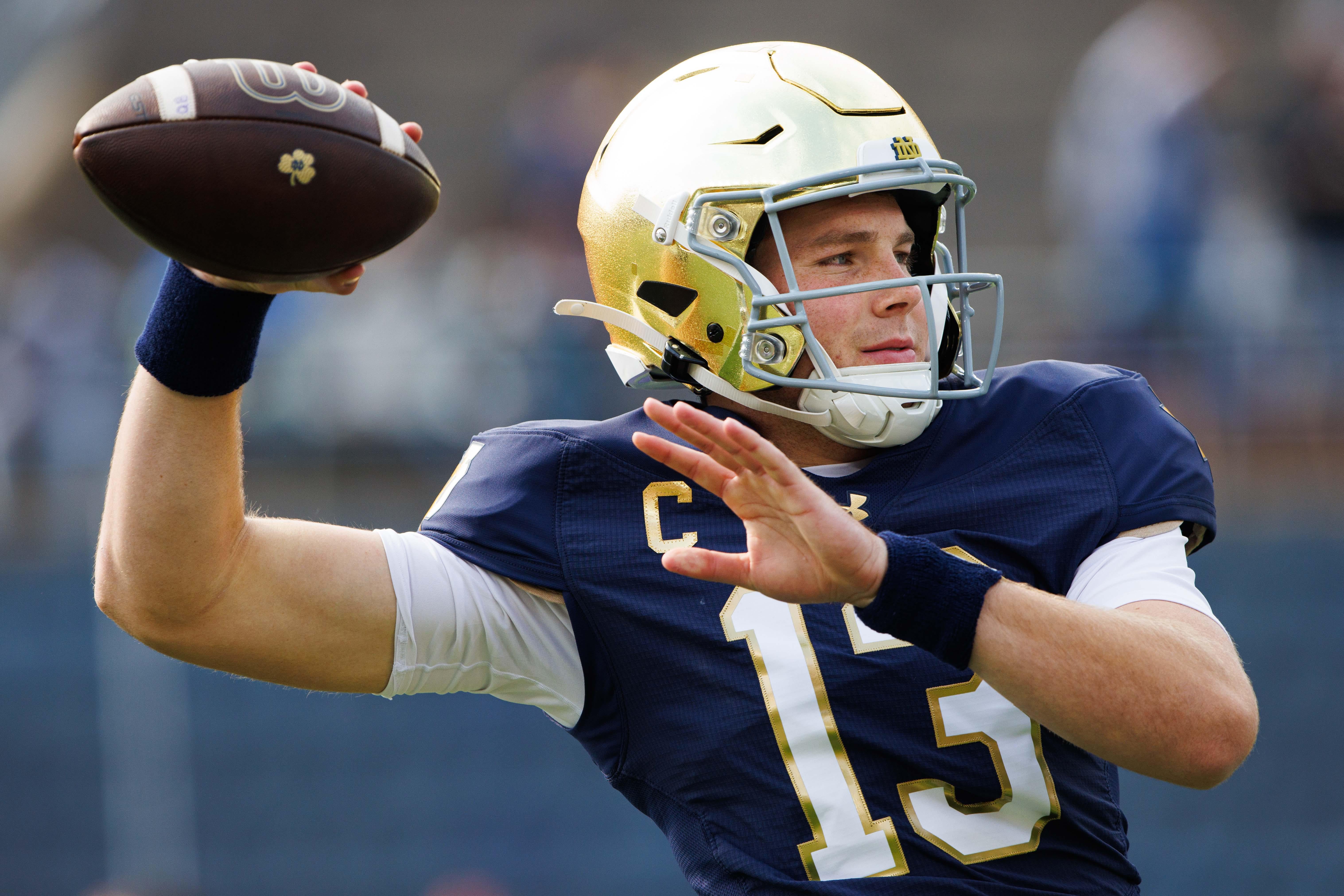 Notre Dame quarterback Riley Leonard warms up before a NCAA college football game between Notre Dame and Stanford at Notre Dame Stadium on Saturday, Oct. 12, 2024, in South Bend.