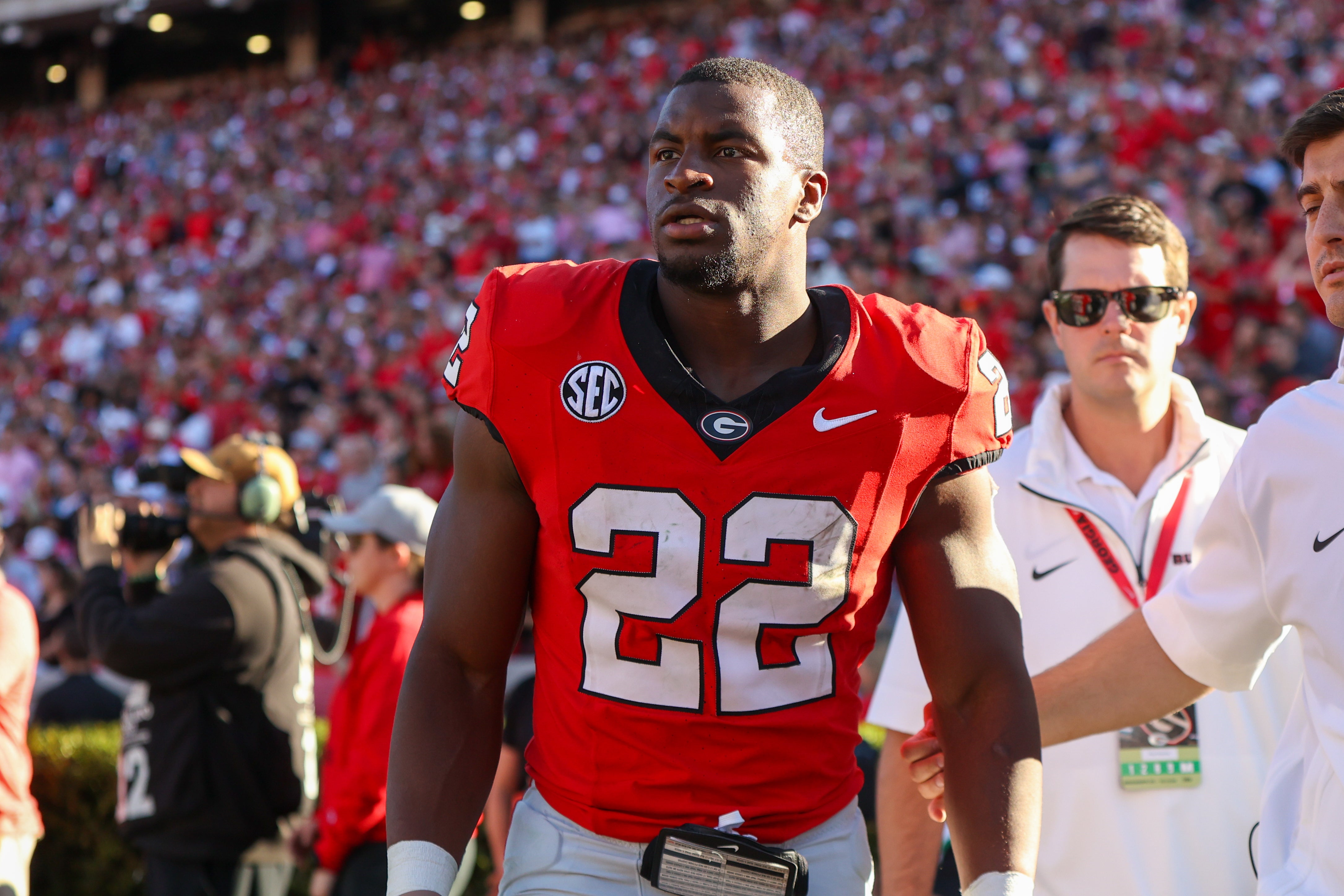 Georgia Bulldogs running back Branson Robinson (22) leaves with an injury against the Mississippi State Bulldogs in the second quarter at Sanford Stadium.