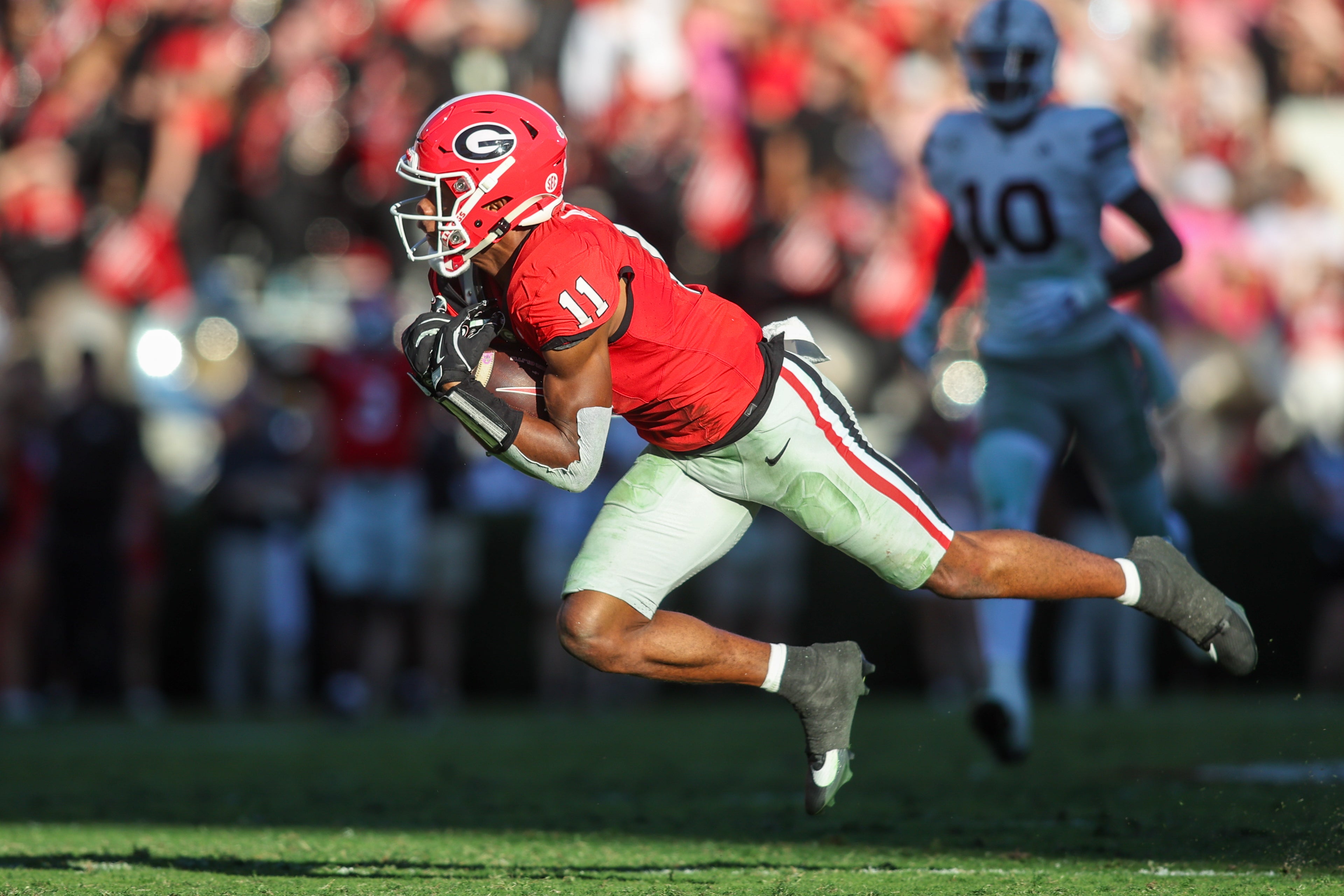 Oct 12, 2024; Athens, Georgia, USA; Georgia Bulldogs wide receiver Arian Smith (11) catches a pass against the Mississippi State Bulldogs in the second quarter at Sanford Stadium.