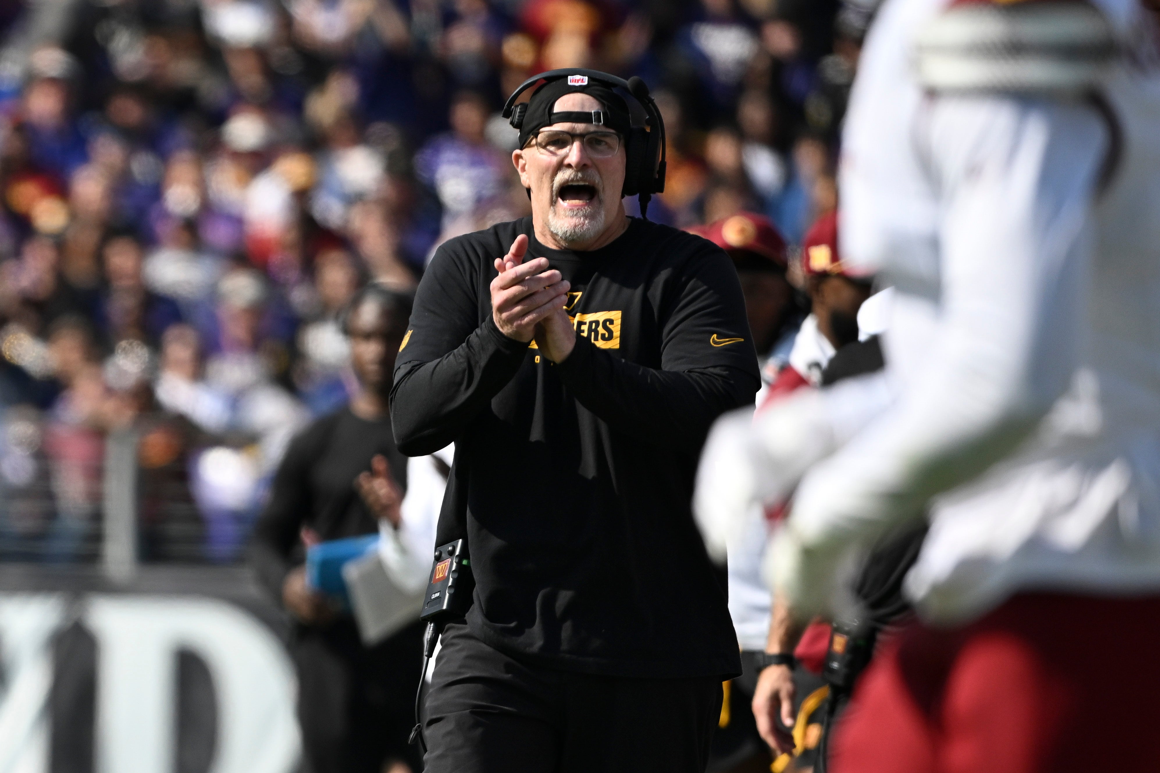 Oct 13, 2024; Baltimore, Maryland, USA; Washington Commanders head coach Dan Quinn reacts during the first half against the Baltimore Ravens at M&T Bank Stadium.