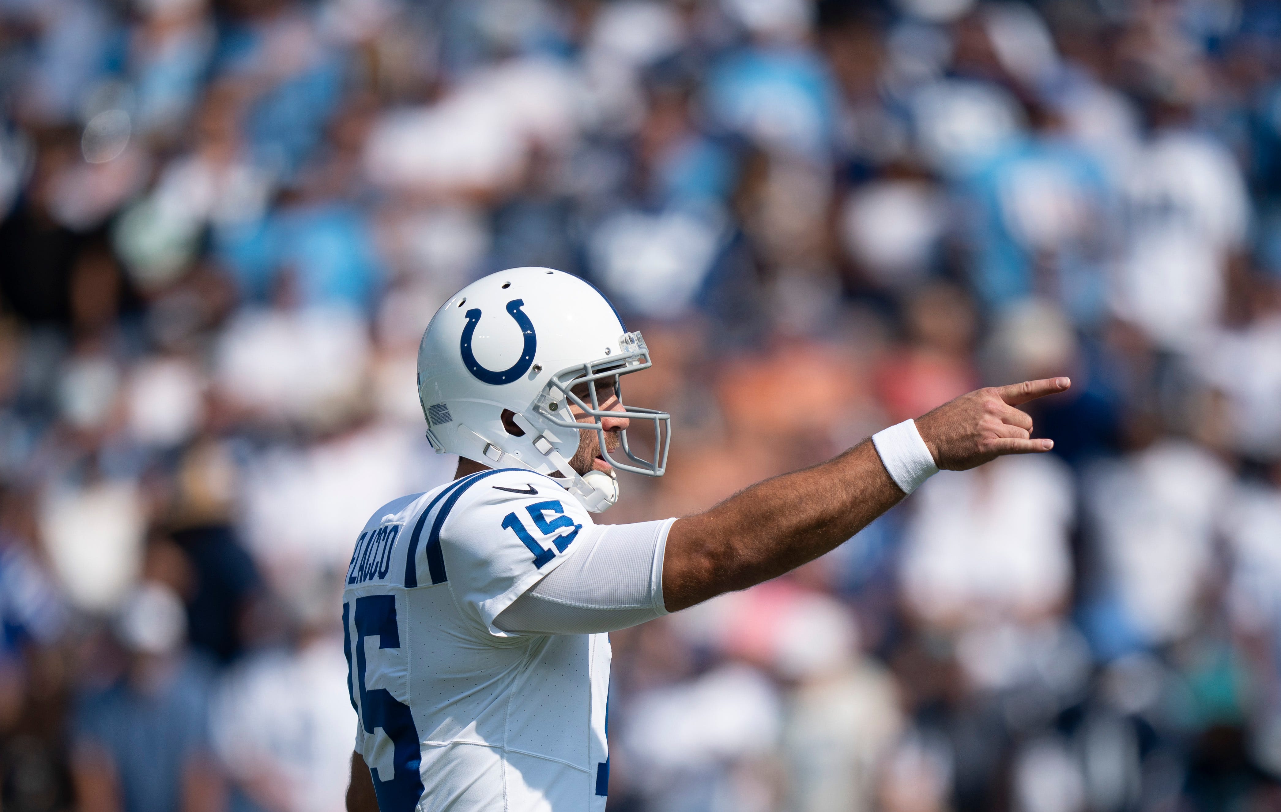 Indianapolis Colts quarterback Joe Flacco (15) calls out to his team against the Tennessee Titans during the first half of their game at Nissan Stadium in Nashville, Tenn., Monday, Oct. 14, 2024.