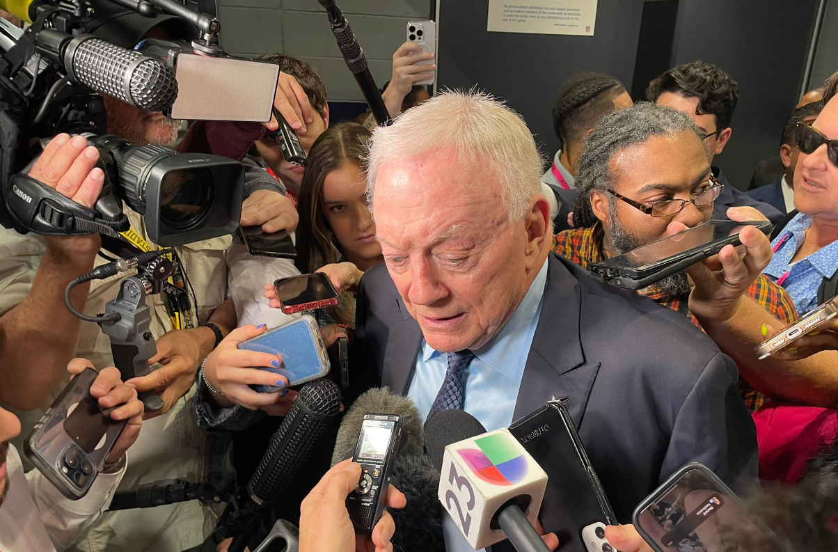 Dallas Cowboys owner Jerry Jones talks to reporters postgame after losing to Detroit Lions.