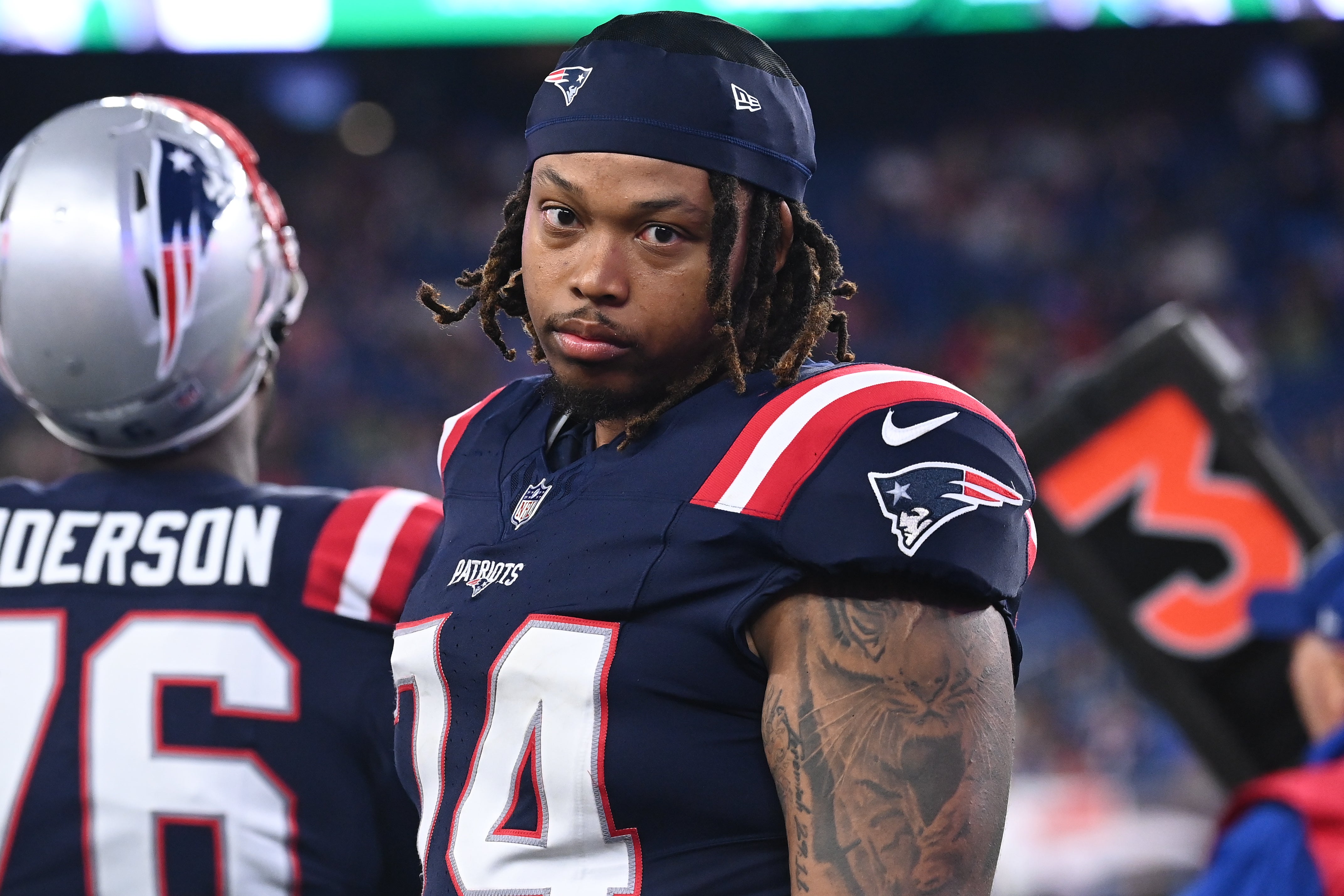 August 8, 2024; Foxborough, MA, USA; New England Patriots guard Michael Jordan (74) on the sideline during the second half against the Carolina Panthers at Gillette Stadium