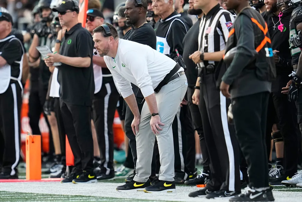Oregon Ducks head coach Dan Lanning watches during the first half of the NCAA football game against the Ohio State Buckeyes at Autzen Stadium