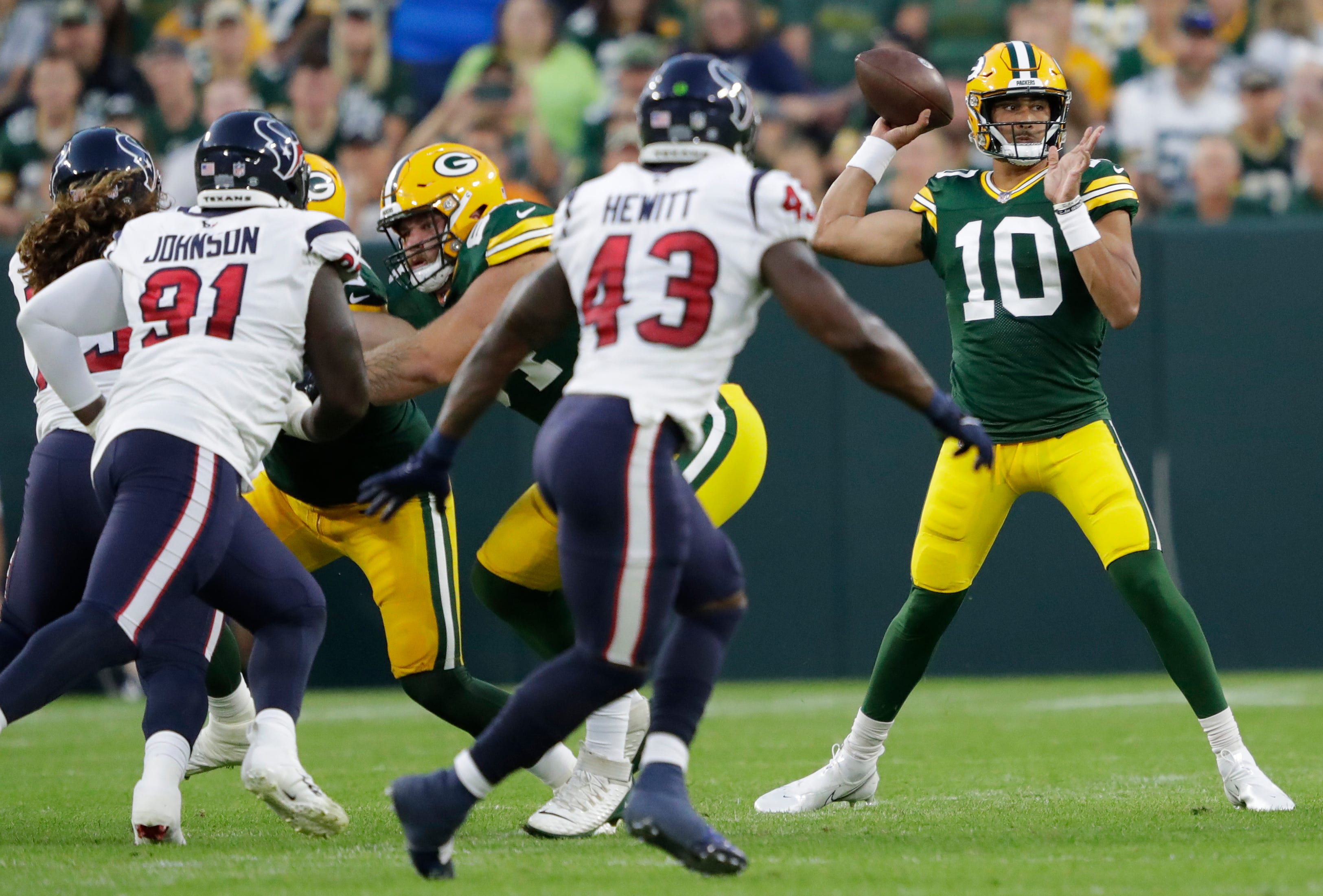 Green Bay Packers quarterback Jordan Love (10) passes agains the Houston Texans during their football game Saturday, August 14, 2021, at Lambeau Field in Green Bay.
