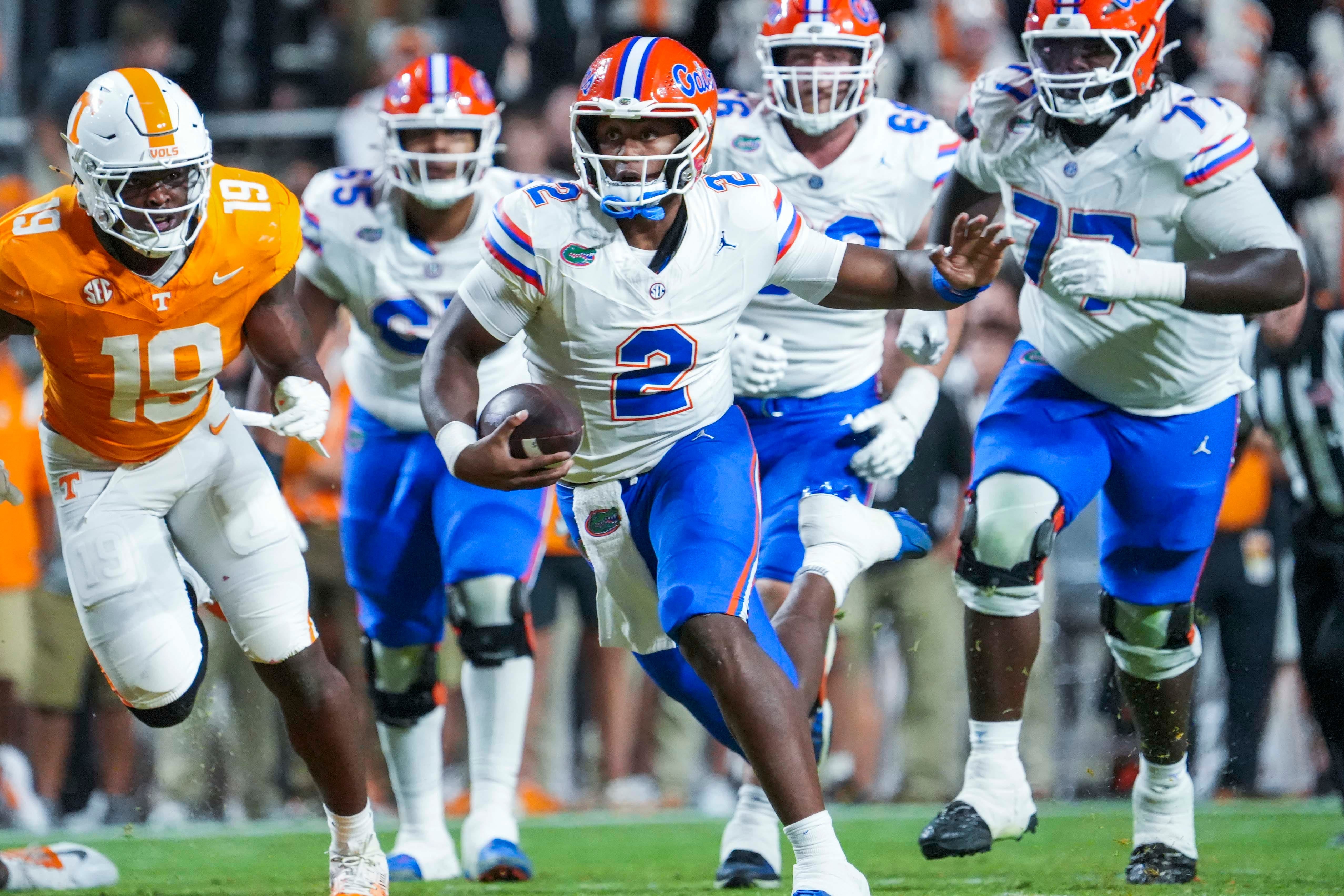 Oct 12, 2024; Knoxville, Tennessee, USA; Florida Gators quarterback DJ Lagway (2) runs with the ball against the Tennessee Volunteer at Neyland Stadium.