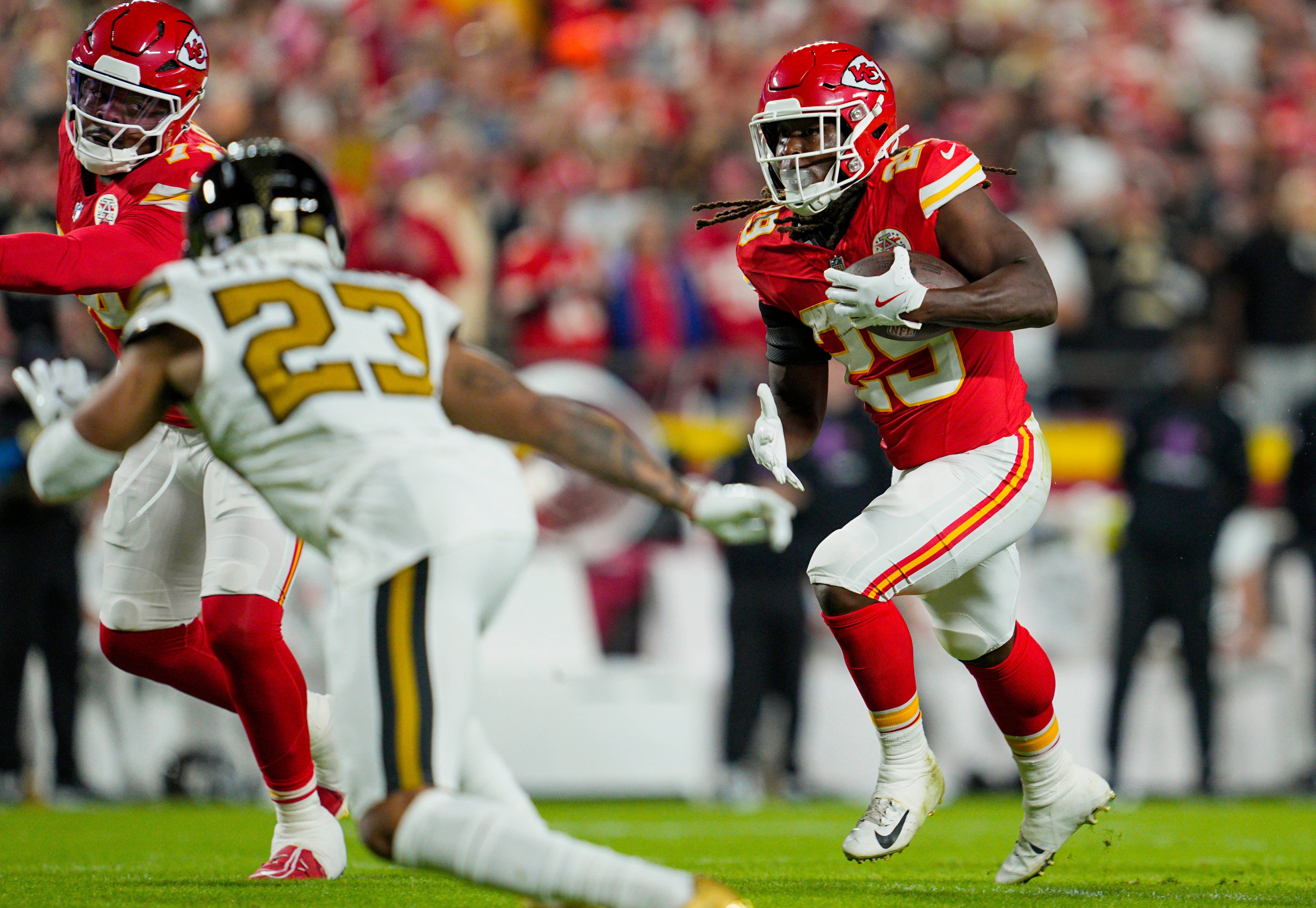 Oct 7, 2024; Kansas City, Missouri, USA; Kansas City Chiefs running back Kareem Hunt (29) runs the ball during the first half against the New Orleans Saints at GEHA Field at Arrowhead Stadium.