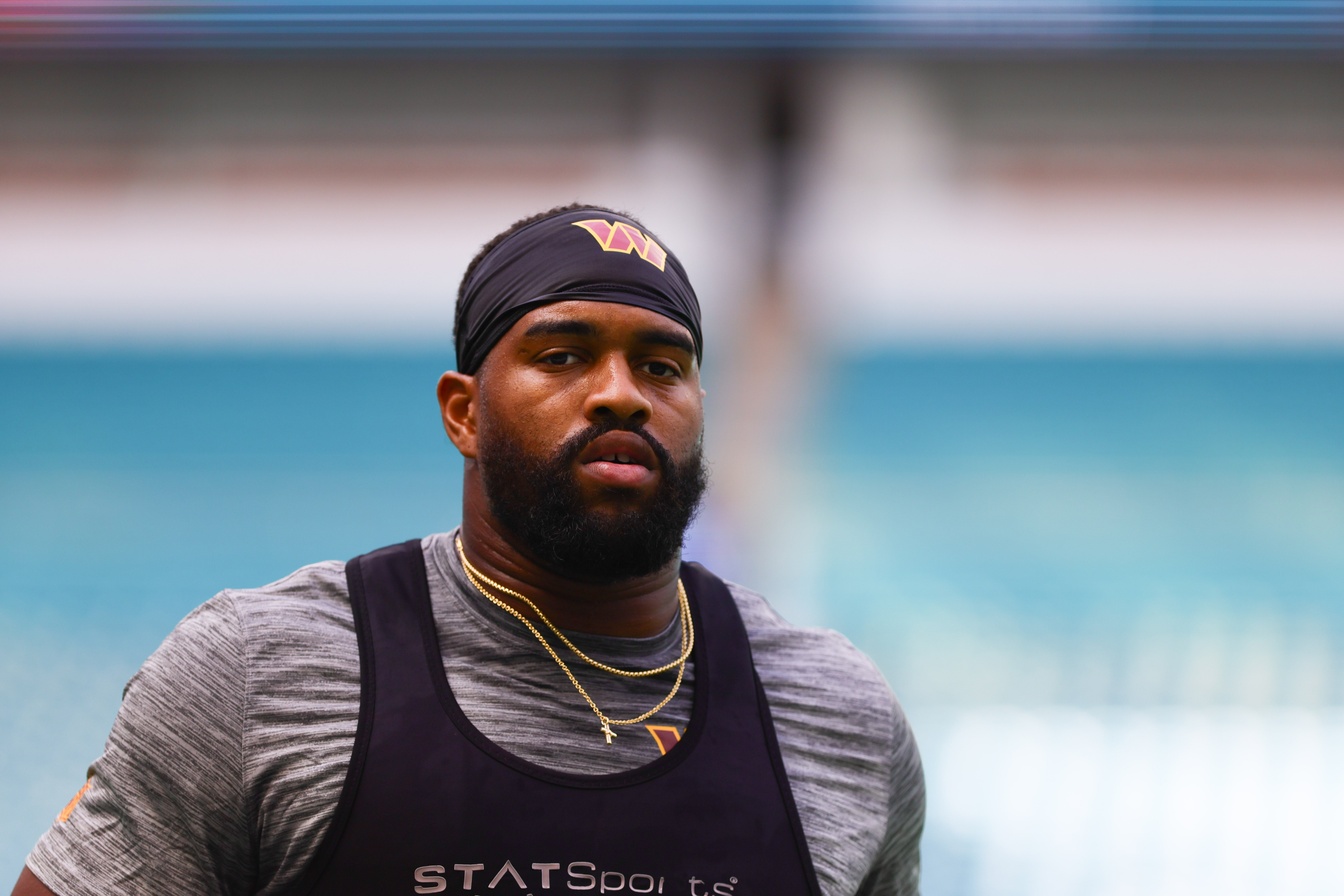 Aug 17, 2024; Miami Gardens, Florida, USA; Washington Commanders defensive tackle Jonathan Allen (93) warms up before a preseason game against the Miami Dolphins at Hard Rock Stadium.