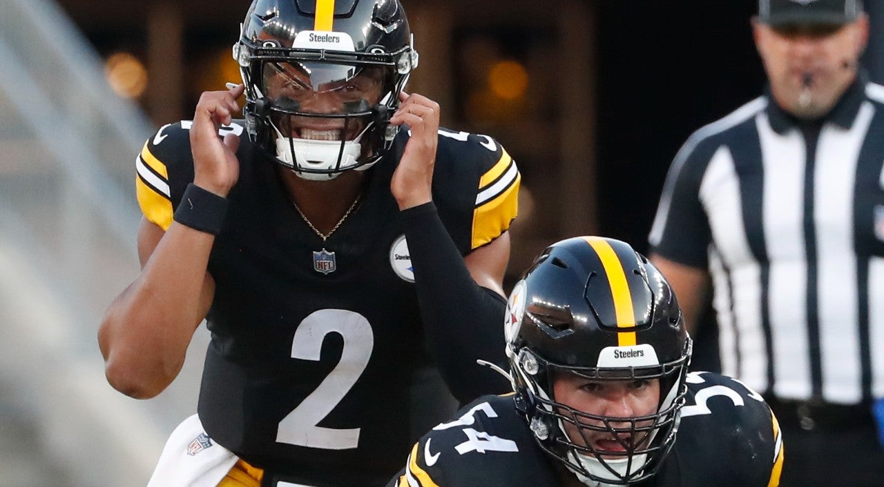 Aug 9, 2024; Pittsburgh, Pennsylvania, USA; Pittsburgh Steelers quarterback Justin Fields (2) calls an audible under center Zach Frazier (54) against the Houston Texans during the first quarter at Acrisure Stadium.