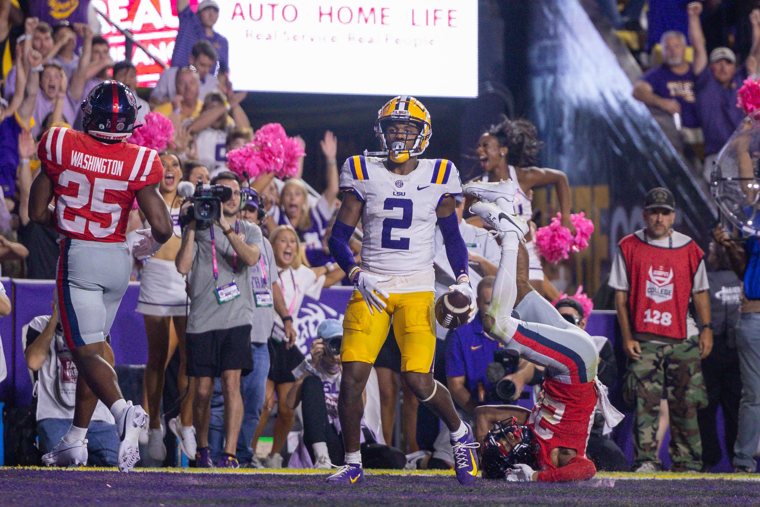 Oct 12, 2024; Baton Rouge, Louisiana, USA; LSU Tigers wide receiver Kyren Lacy (2) scores a touchdown in overtime against the Mississippi Rebels at Tiger Stadium.