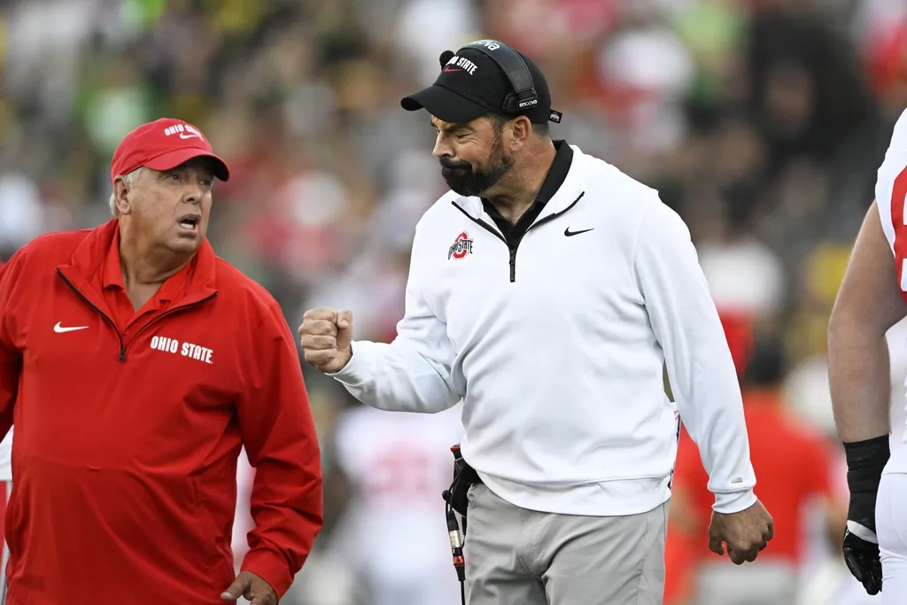 Ohio State Buckeyes head coach Ryan Day reacts after a touchdown during the first half against the Oregon Ducks at Autzen Stadium.