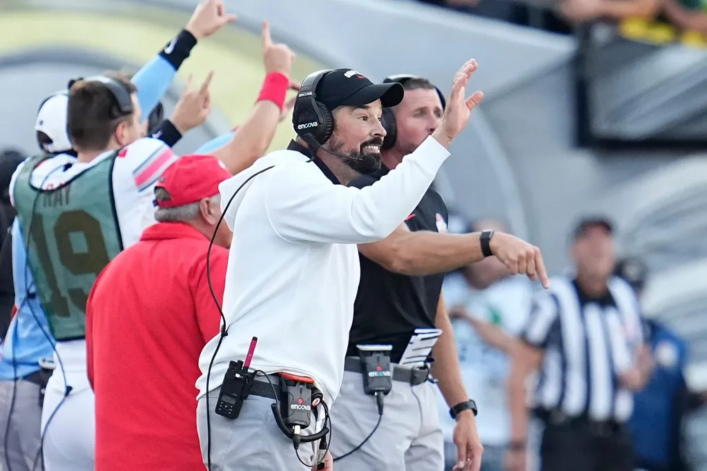 Ohio State Buckeyes head coach Ryan Day motions during the first half of the NCAA football game against the Oregon Ducks at Autzen Stadium.