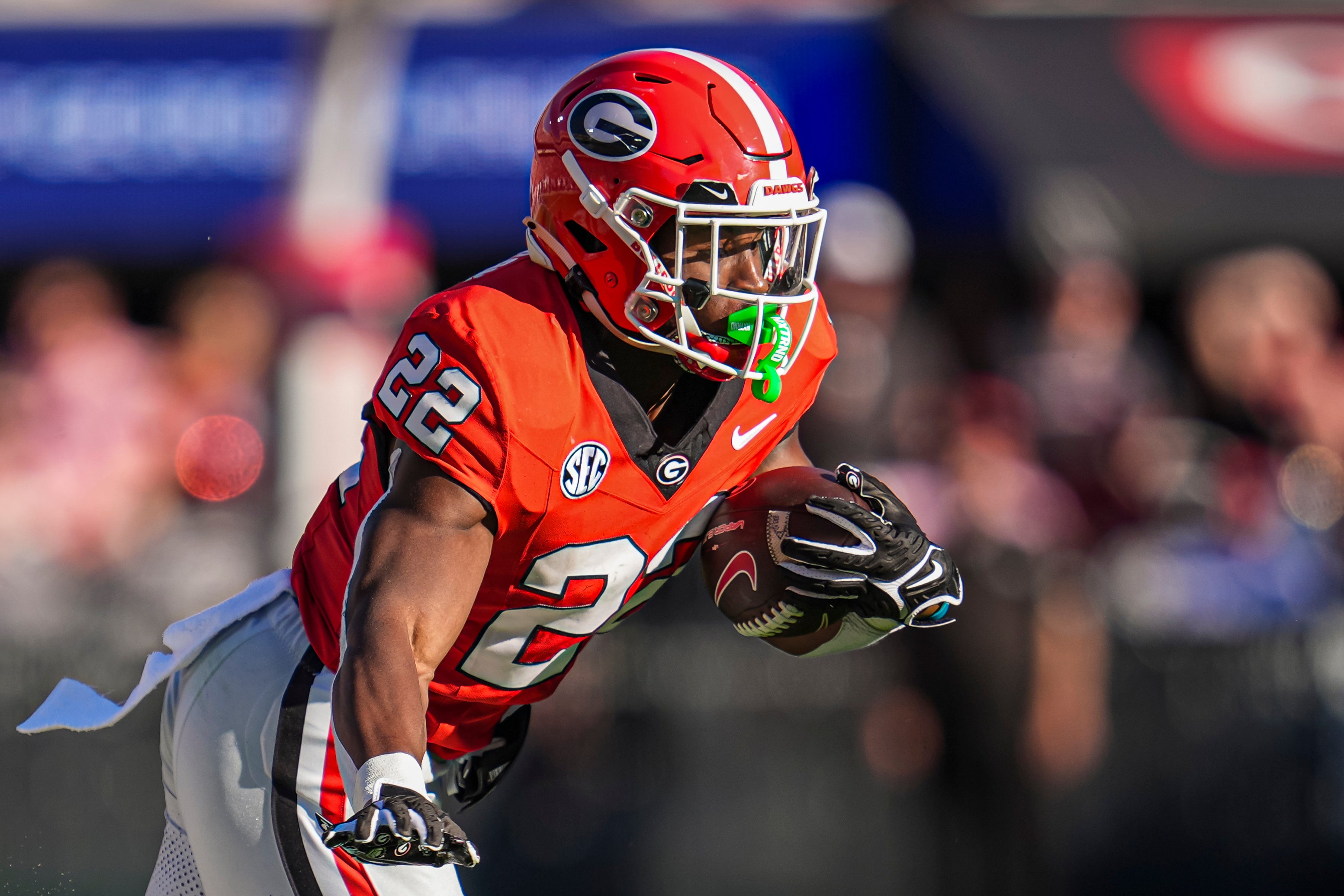 Georgia Bulldogs running back Branson Robinson (22) runs the ball against the Mississippi State Bulldogs at Sanford Stadium.