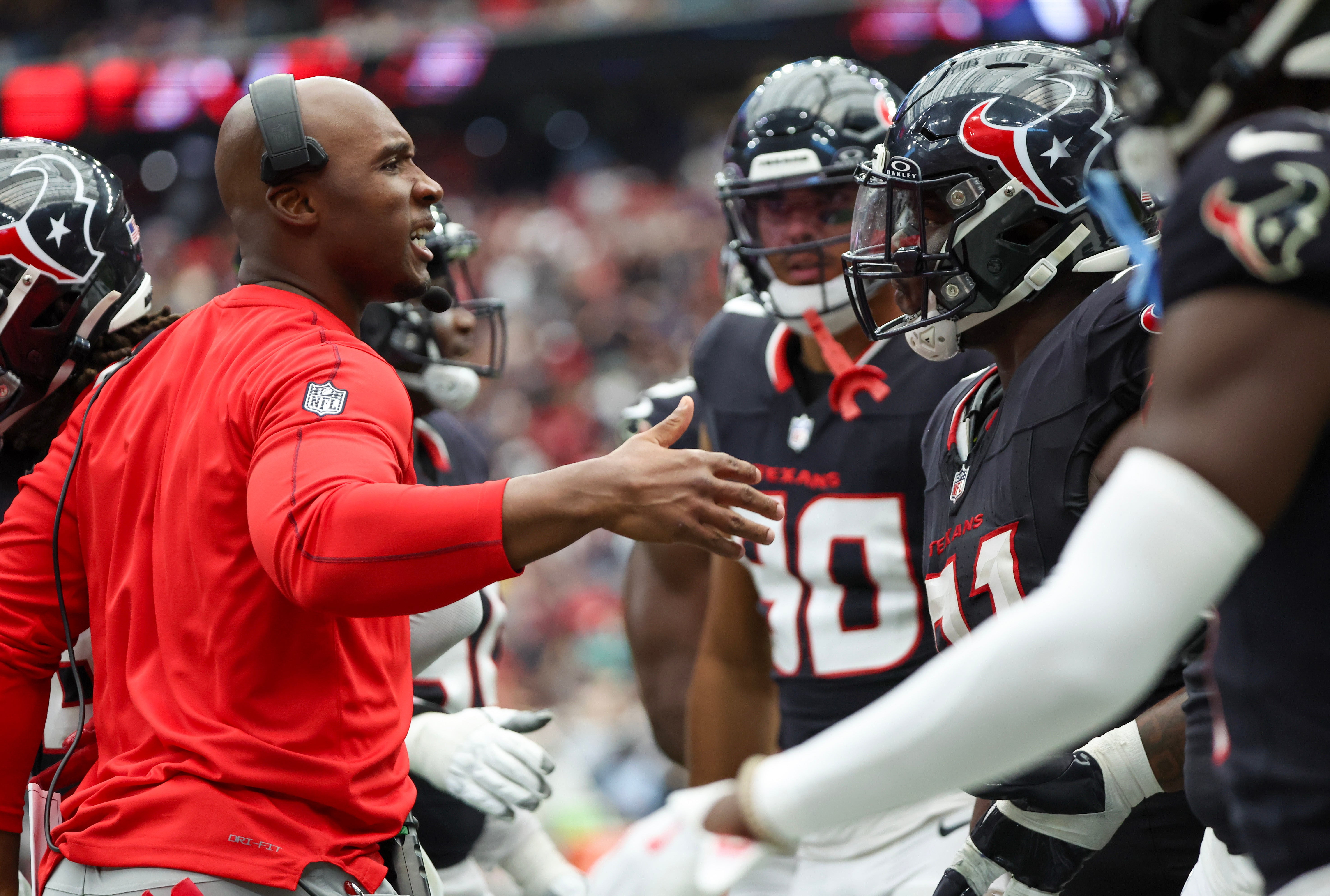 Sep 29, 2024; Houston, Texas, USA; Houston Texans head coach DeMeco Ryans celebrates defensive tackle Folorunso Fatukasi (91) defensive stop against Jacksonville Jaguars quarterback Trevor Lawrence (16) in the second half at NRG Stadium.