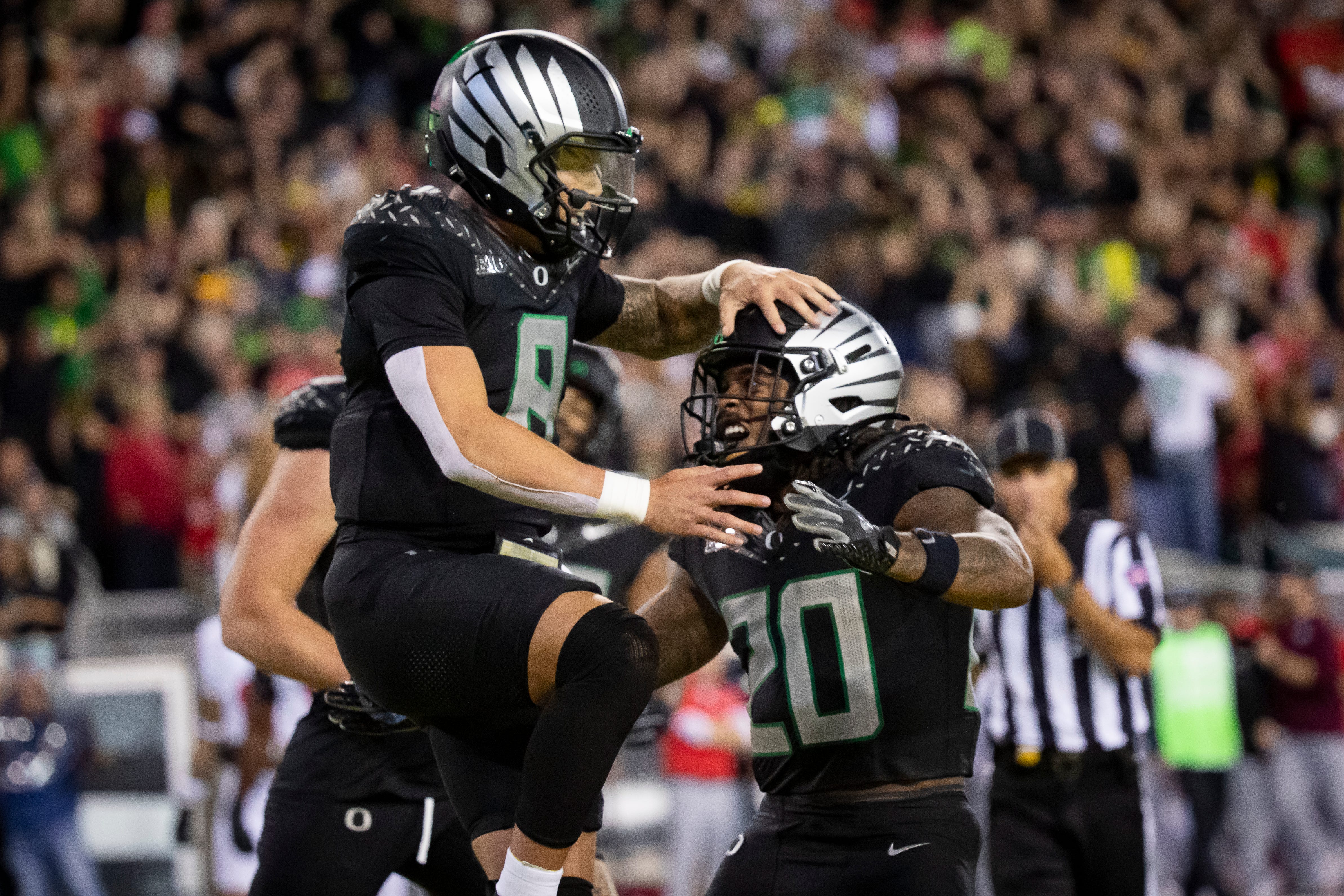 Oregon Ducks quarterback Dillon Gabriel and Oregon Ducks running back Jordan James celebrate a touchdown by Gabriel as the No. 3 Oregon Ducks host the No. 2 Ohio State Buckeyes Saturday, Oct. 12, 2024 at Autzen Stadium in Eugene, Ore.
