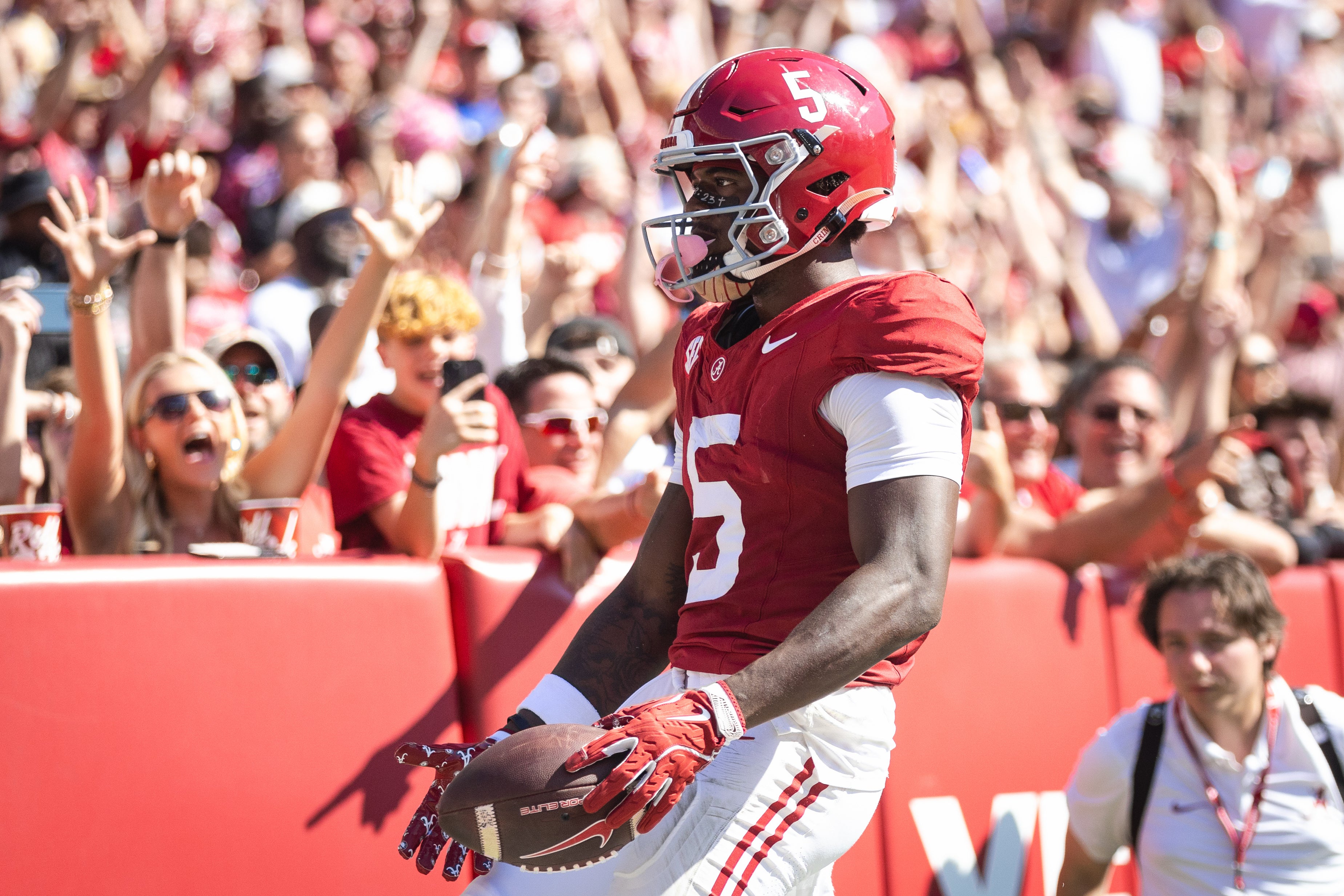 Oct 12, 2024; Tuscaloosa, Alabama, USA; Alabama Crimson Tide wide receiver Germie Bernard (5) scores a touchdown against the South Carolina Gamecocks during the fourth quarter at Bryant-Denny Stadium.
