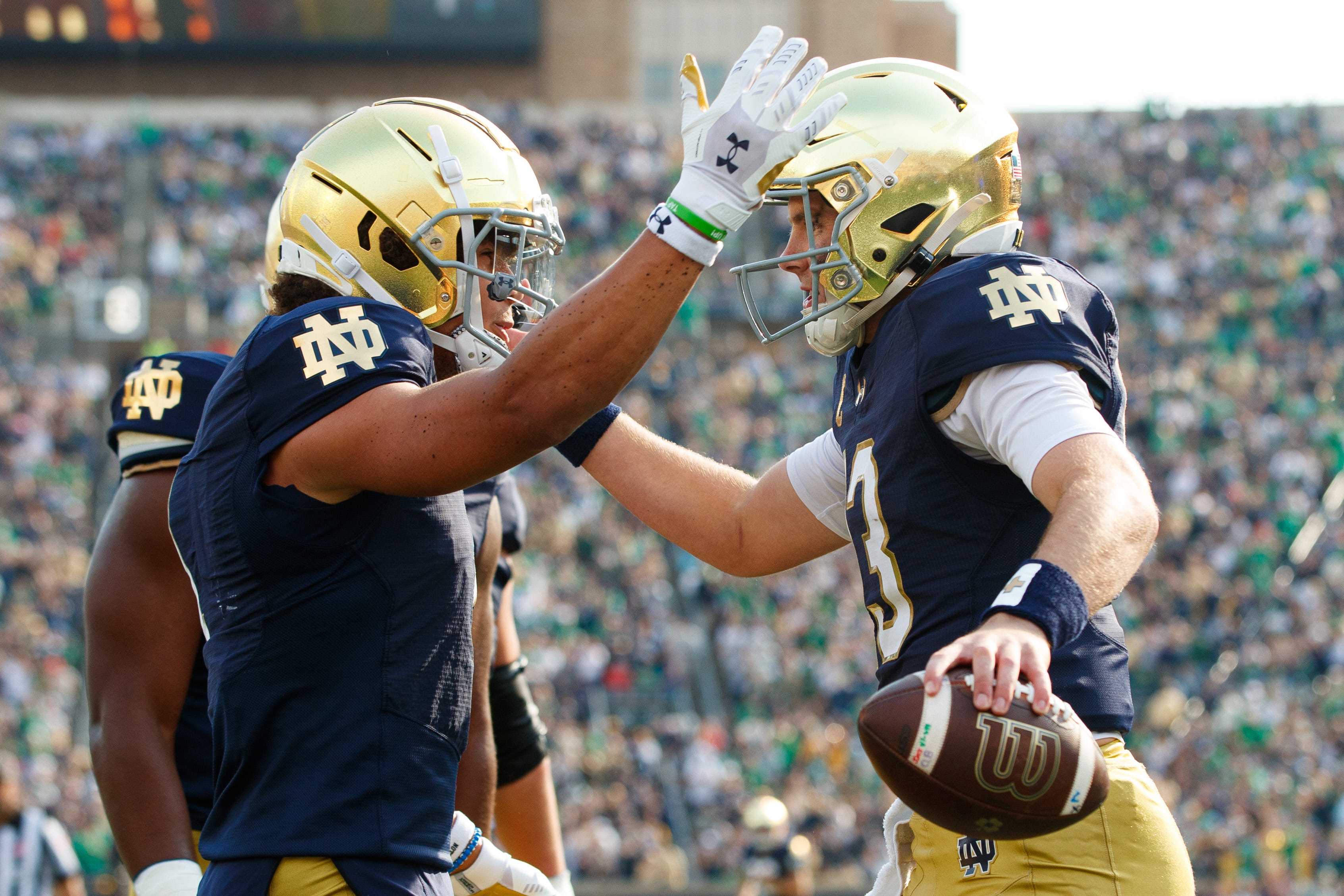 Notre Dame quarterback Riley Leonard, right, and wide receiver Jaden Greathouse celebrate touchdown scored by Leonard during a NCAA college football game between Notre Dame and Stanford at Notre Dame Stadium on Saturday, Oct. 12, 2024, in South Bend.