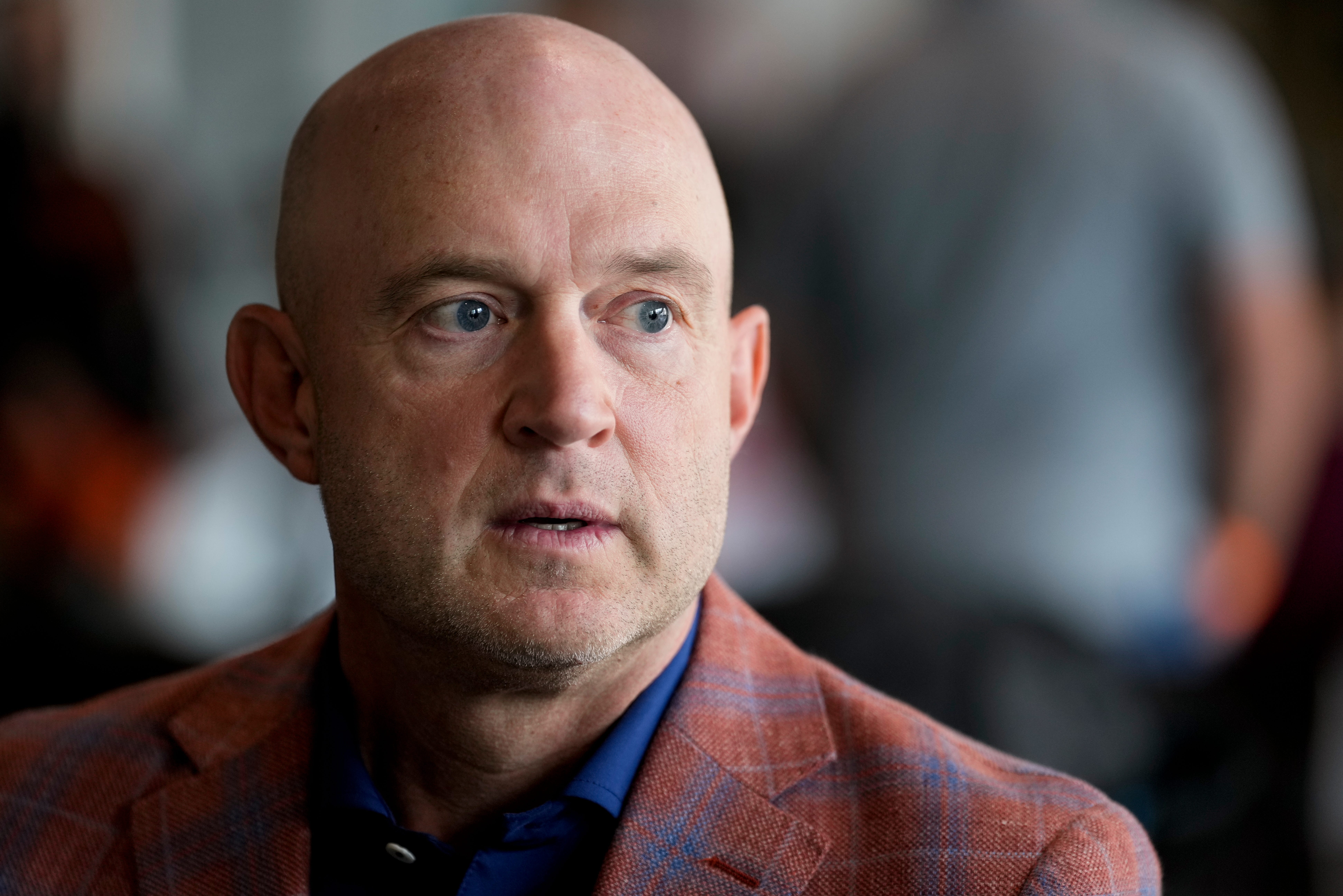Duke Tobin, director of player personnel, takes questions from reporters during the annual Cincinnati Bengals season kickoff luncheon at Paycor Stadium in downtown Cincinnati on Monday, July 22, 2024.  