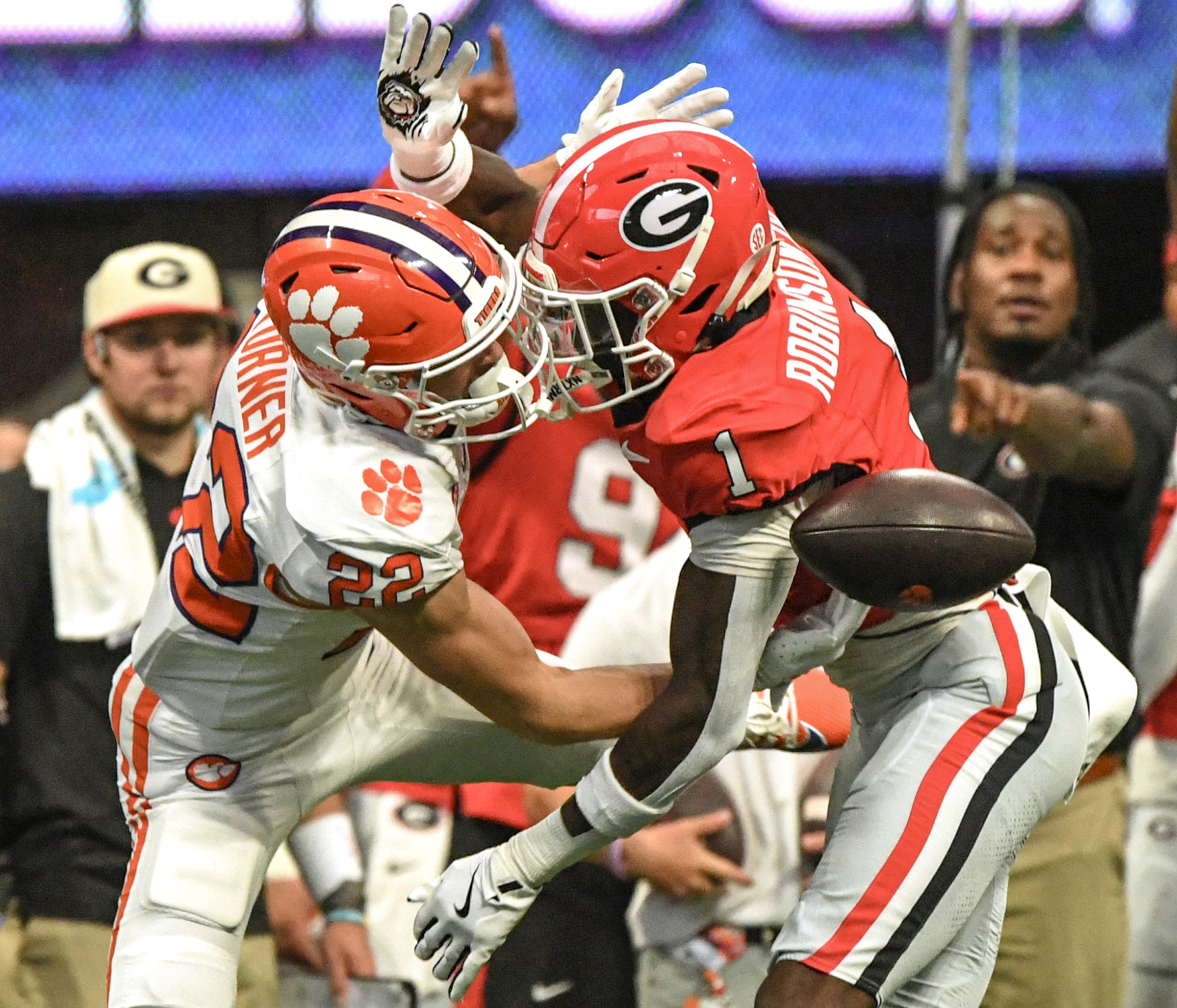 Georgia Bulldogs defensie back Ellis Robinson IV (1) breaks up a pass for Clemson Tigers wide receiver Cole Turner (22) during the fourth quarter of the 2024 Aflac Kickoff Game