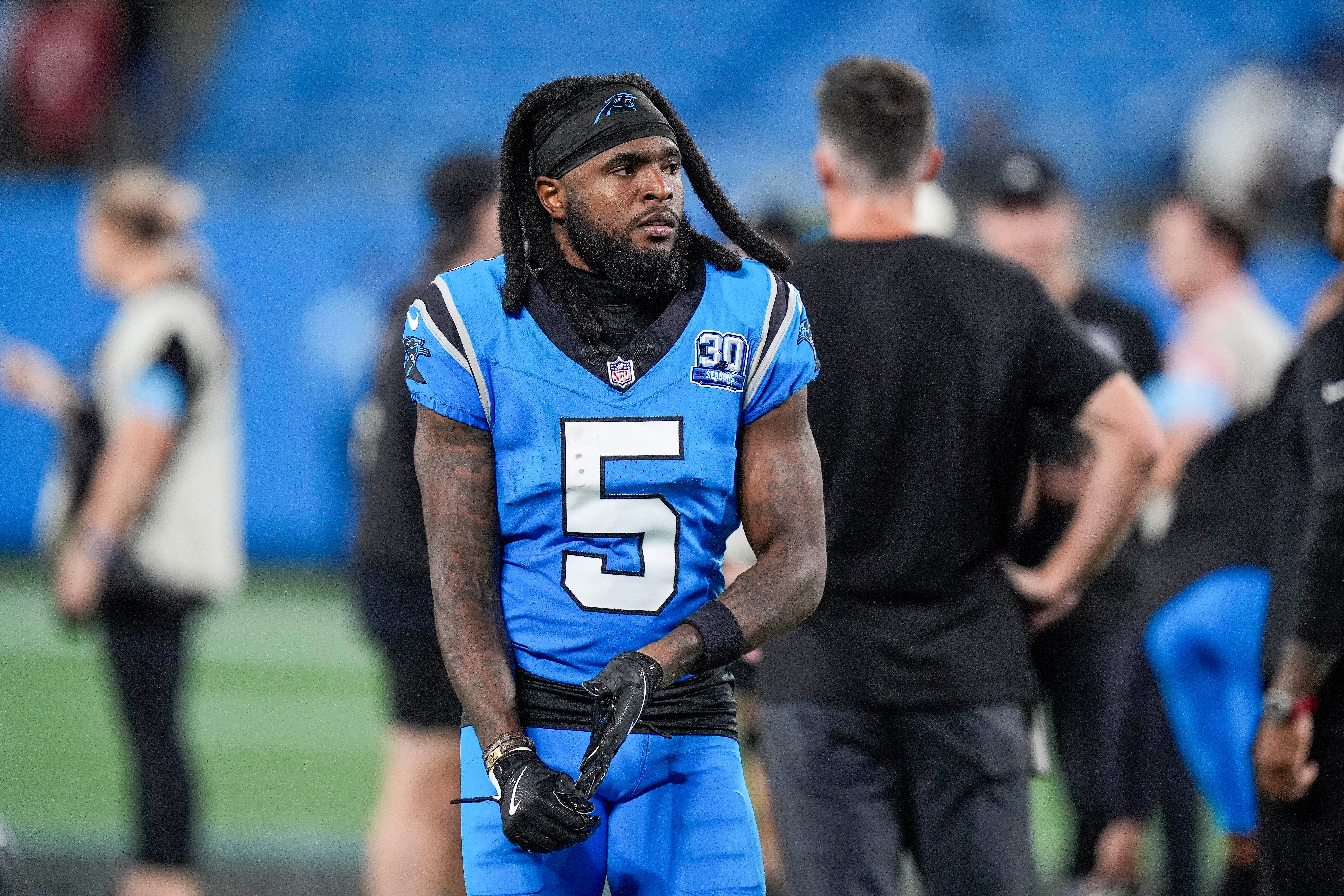 Oct 13, 2024; Charlotte, North Carolina, USA; Carolina Panthers wide receiver Diontae Johnson (5) makes his way back to the locker room after the end of the second half against the Atlanta Falcons at Bank of America Stadium.