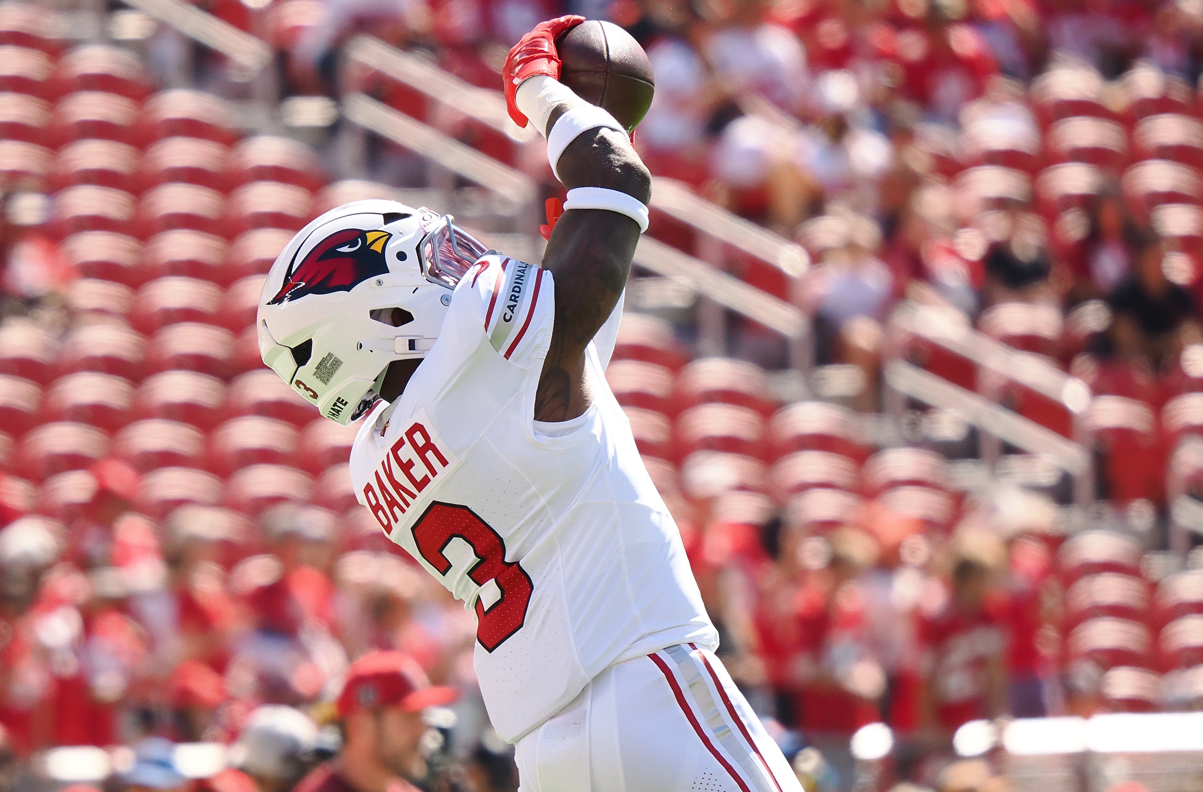 Arizona Cardinals safety Budda Baker (3) catches the ball during warm ups before the game against the San Francisco 49ers at Levi's Stadium.