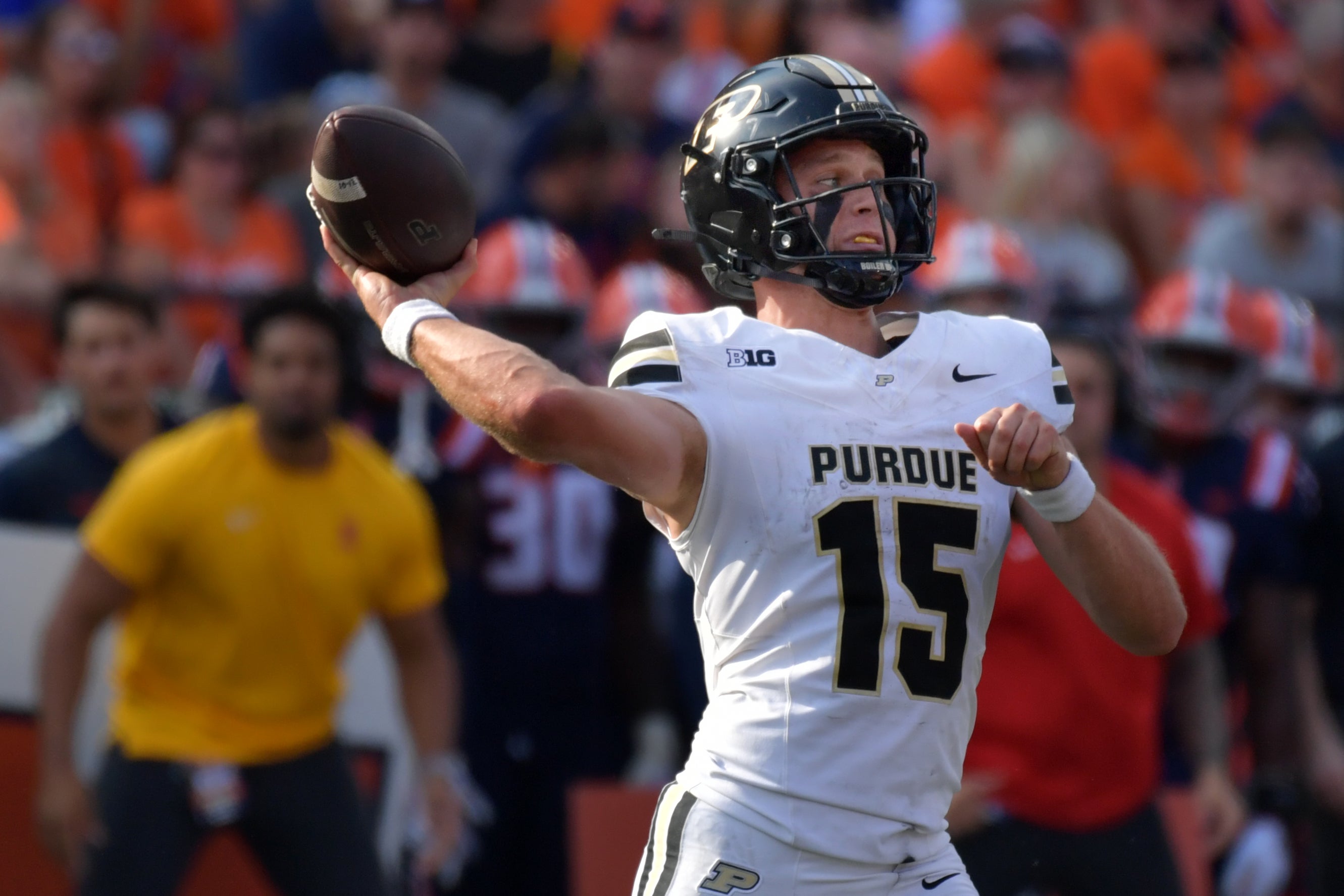Purdue Boilermakers quarterback Ryan Browne (15) passes in the first half against the Illinois Fighting Illini at Memorial Stadium.