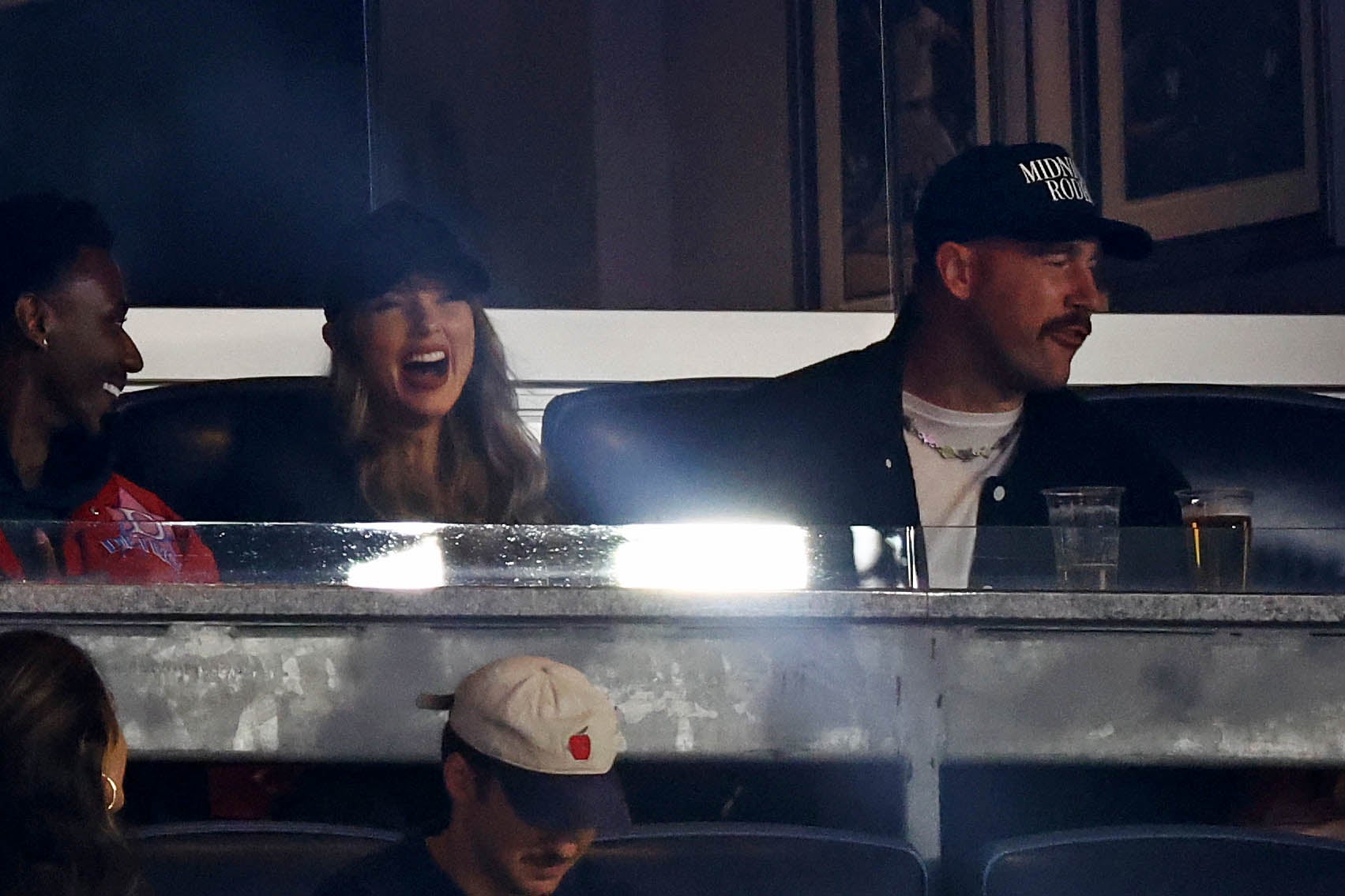 Oct 14, 2024; Bronx, New York, USA; Recording artist Taylor Swift and Kansas City Chiefs tight end Travis Kelce watch game one of the ALCS for the 2024 MLB Playoffs between the New York Yankees and the Cleveland Guardians at Yankee Stadium.