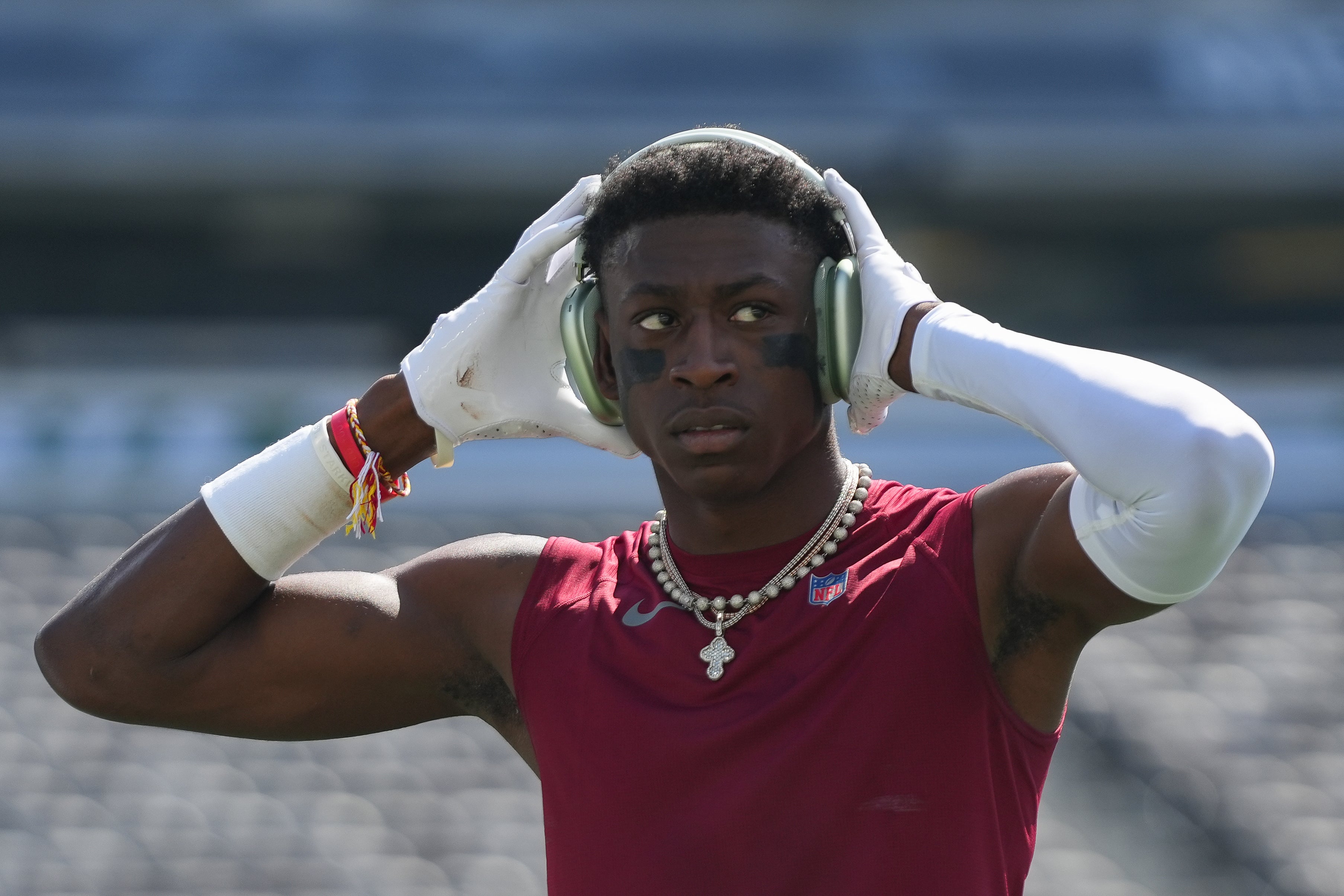 Aug 10, 2024; East Rutherford, New Jersey, USA; Washington Commanders cornerback Emmanuel Forbes (13) warms up before the game against the New York Jets at MetLife Stadium.