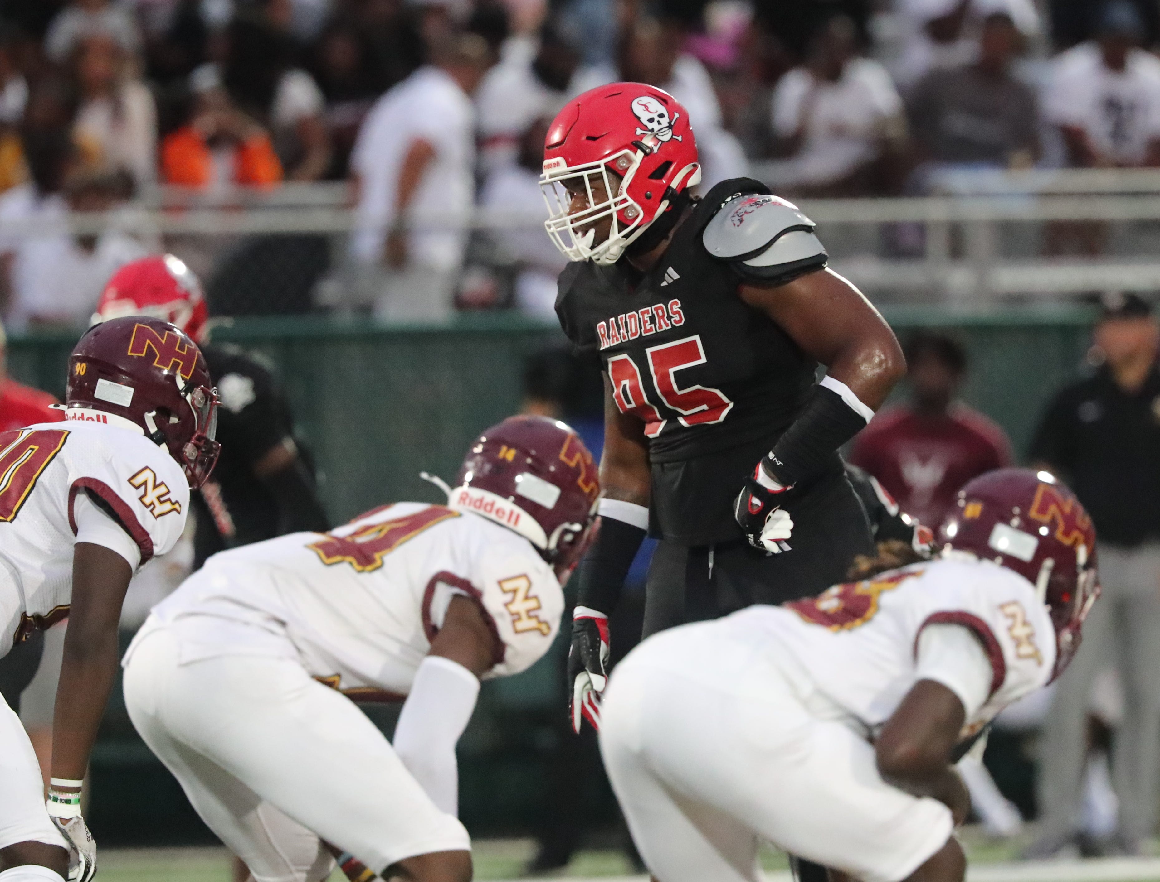 Savannah Christian's Elijah Griffin looks over the New Hampstead offense on Friday, August 23, 2024 at Pooler Stadium.