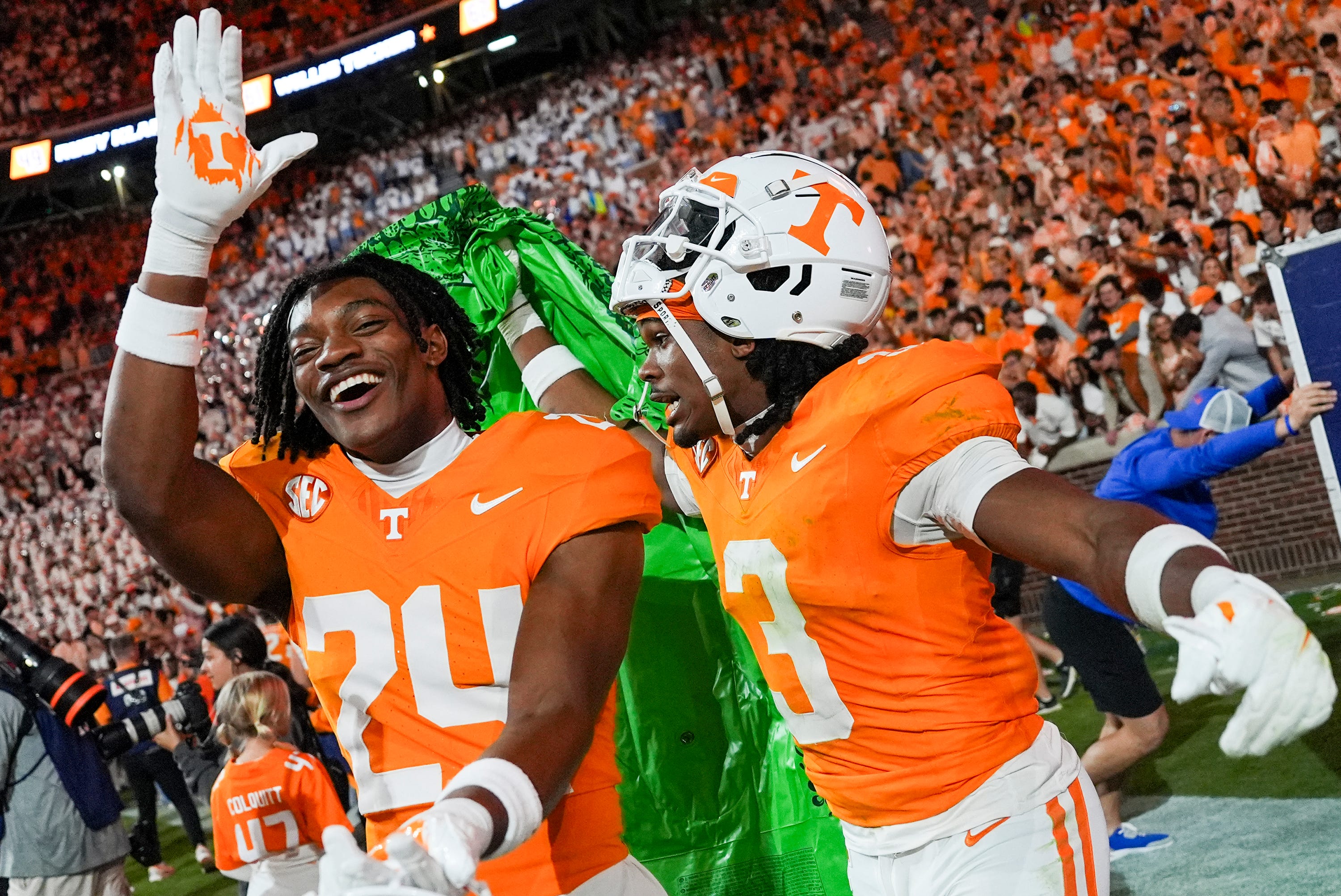 Tennessee defensive back Jordan Matthews (24) gator chomps as Tennessee defensive back Jermod McCoy (3) carries a deflated inflatable alligator after a SEC conference game between Tennessee and Florida in Neyland Stadium on Saturday, Oct. 12, 2024.