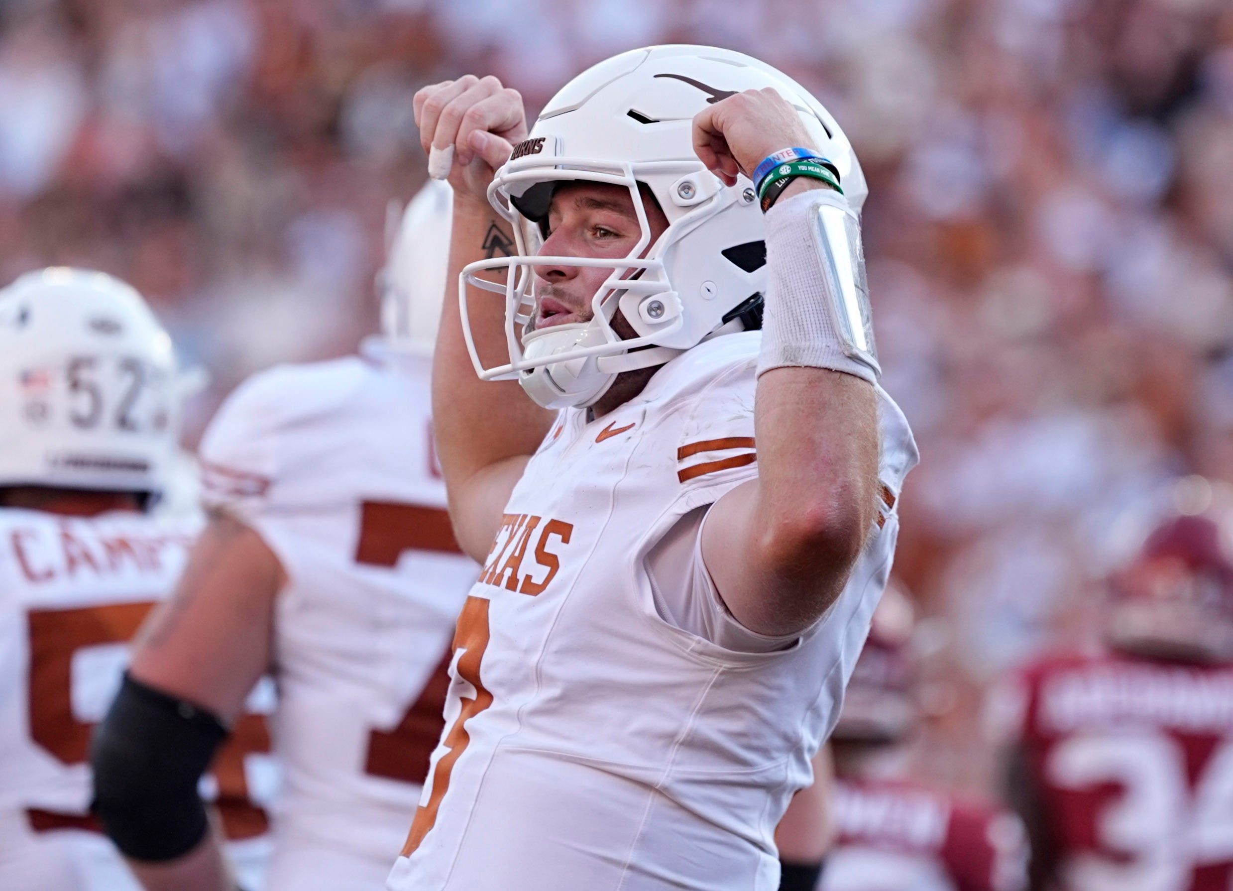 Texas Longhorns quarterback Quinn Ewers (3) celebrates a touchdown in the second half of the Red River Rivalry college football game between the University of Oklahoma Sooners and the Texas Longhorn at the Cotton Bowl Stadium in Dallas, Texas, Saturday, Oct., 12, 2024.