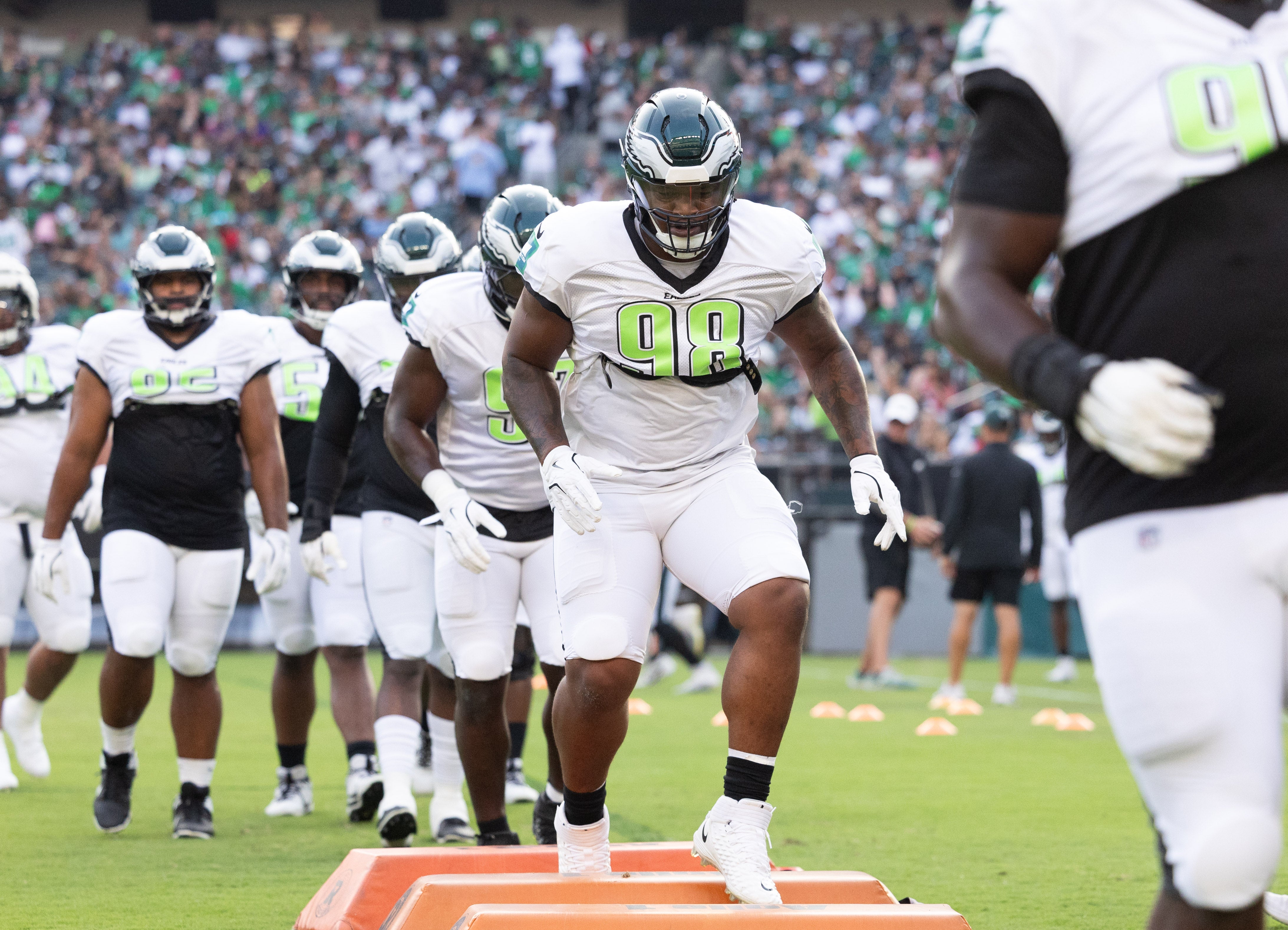Philadelphia Eagles defensive tackle Jalen Carter (98) runs drills during a training camp practice at Lincoln Financial Field.