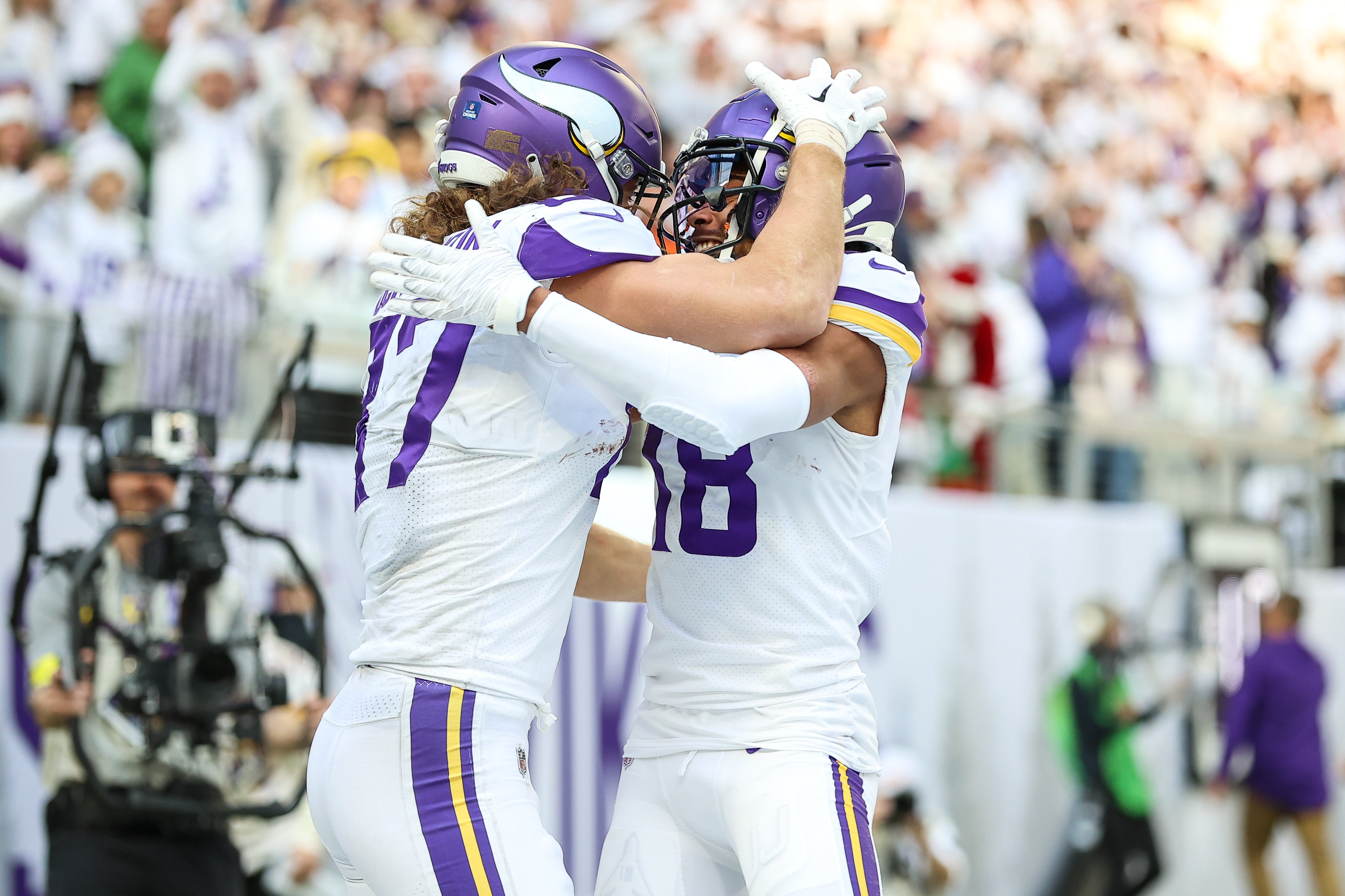 Dec 24, 2022; Minneapolis, Minnesota, USA; Minnesota Vikings tight end T.J. Hockenson (87) celebrates his touchdown with wide receiver Justin Jefferson (18) during the first quarter against the New York Giants at U.S. Bank Stadium.