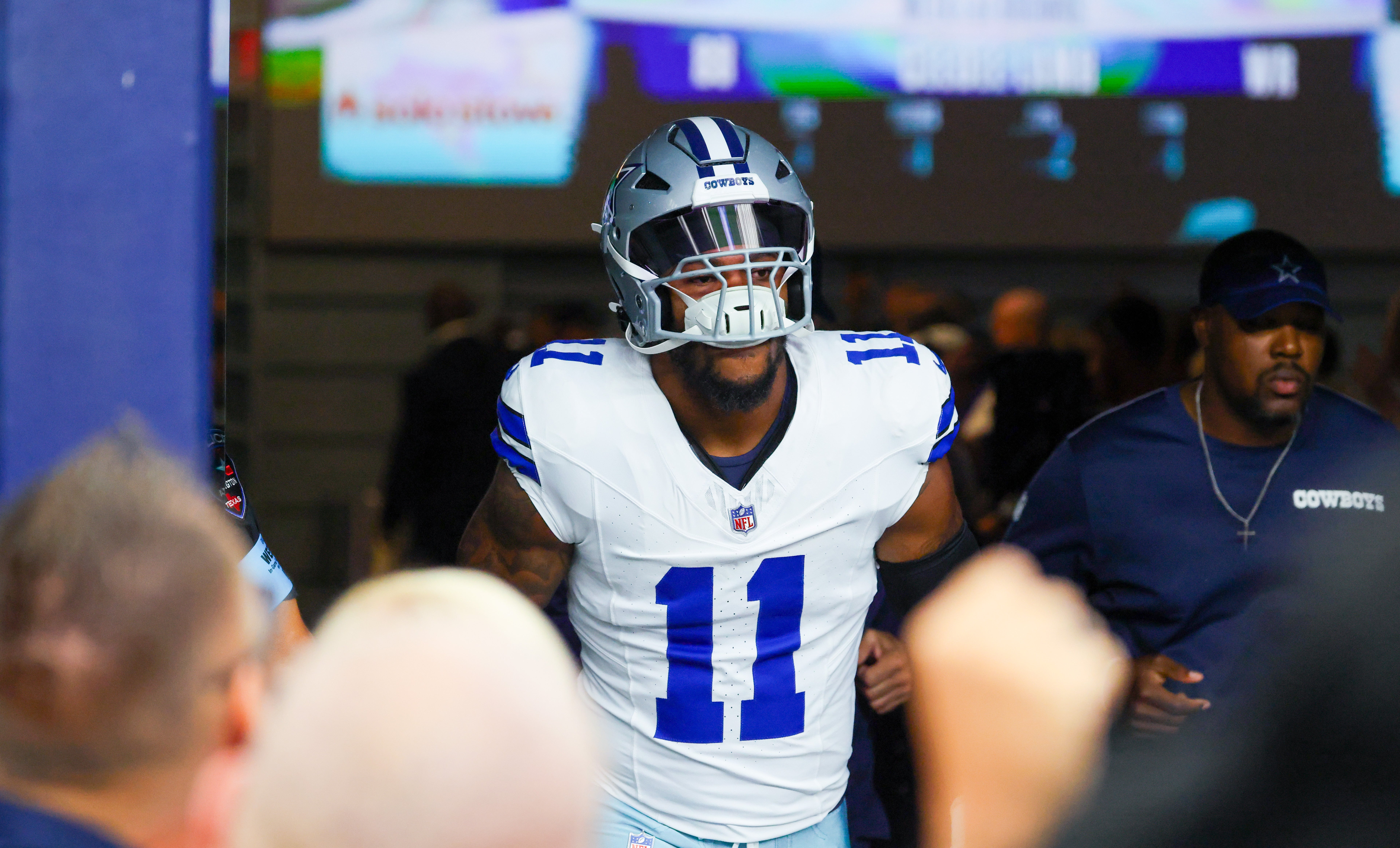 Dallas Cowboys linebacker Micah Parsons (11) enters the field before the game against the New Orleans Saints at AT&T Stadium.
