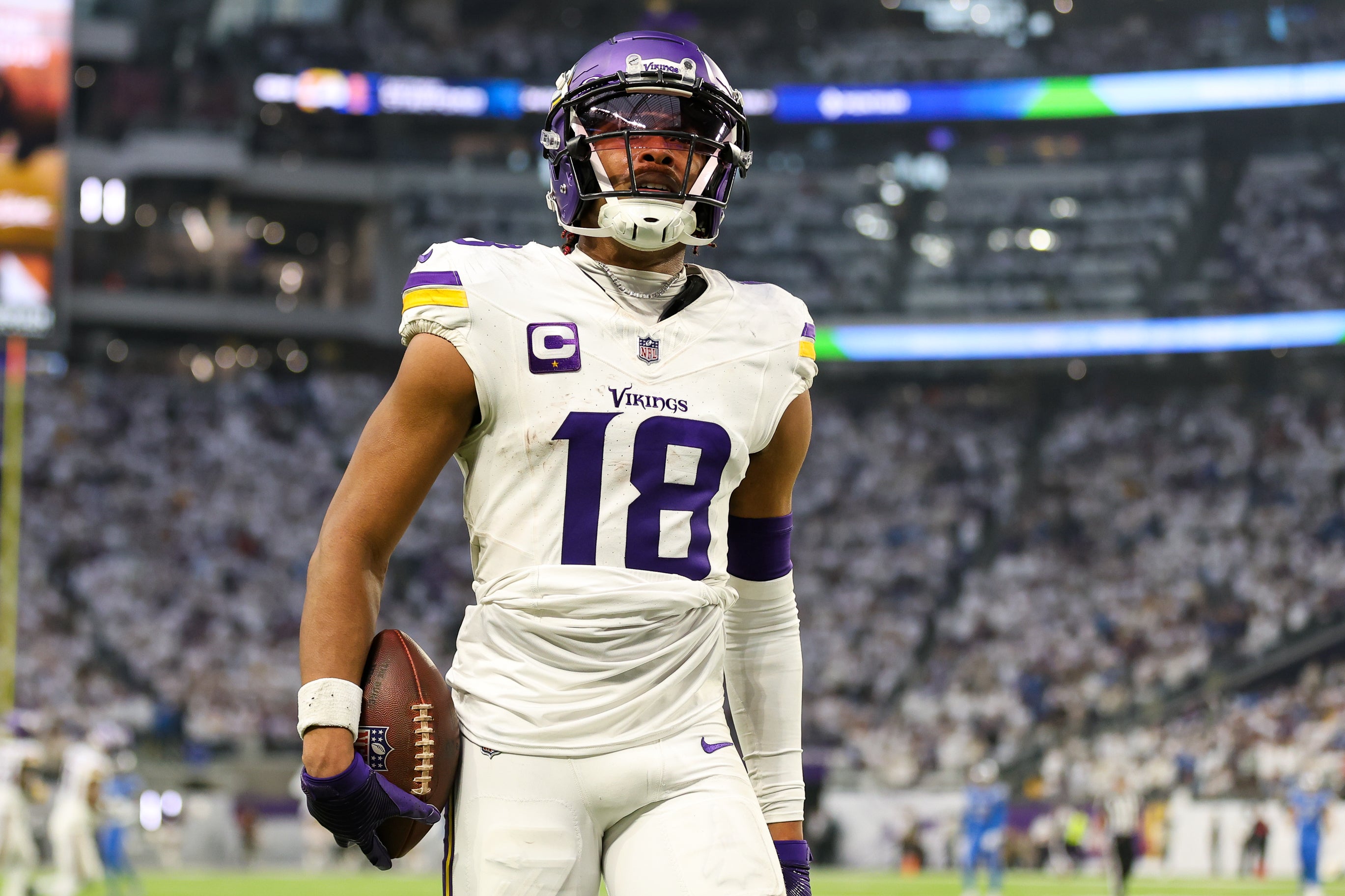 Dec 24, 2023; Minneapolis, Minnesota, USA; Minnesota Vikings wide receiver Justin Jefferson (18) celebrates his touchdown against the Detroit Lions during the second quarter at U.S. Bank Stadium.